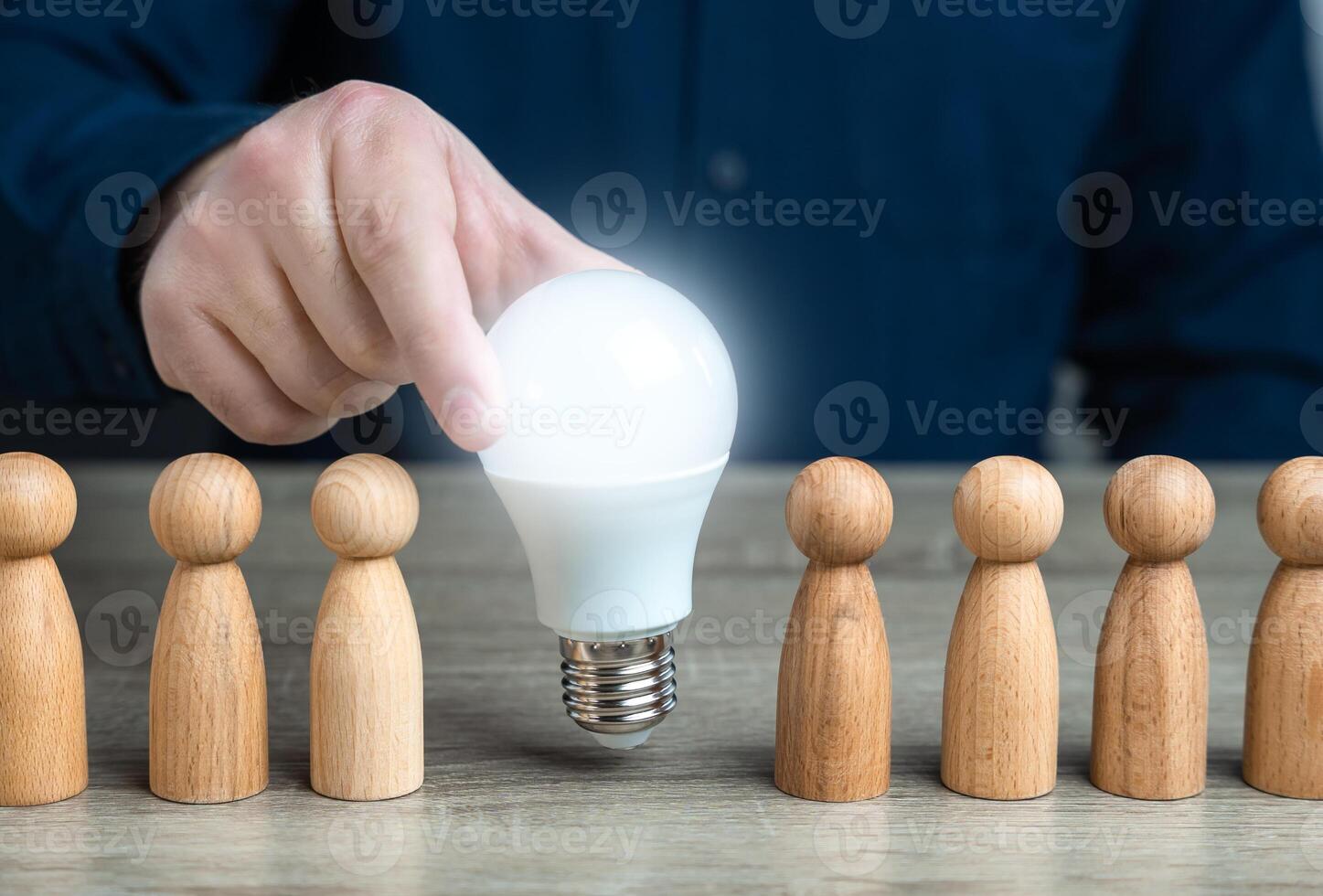 Ideas and motivations in a business team. Inspire society to new ideas. Teamwork brainstorming. Research and development. Enlightenment and education. Ideology, paradigm photo