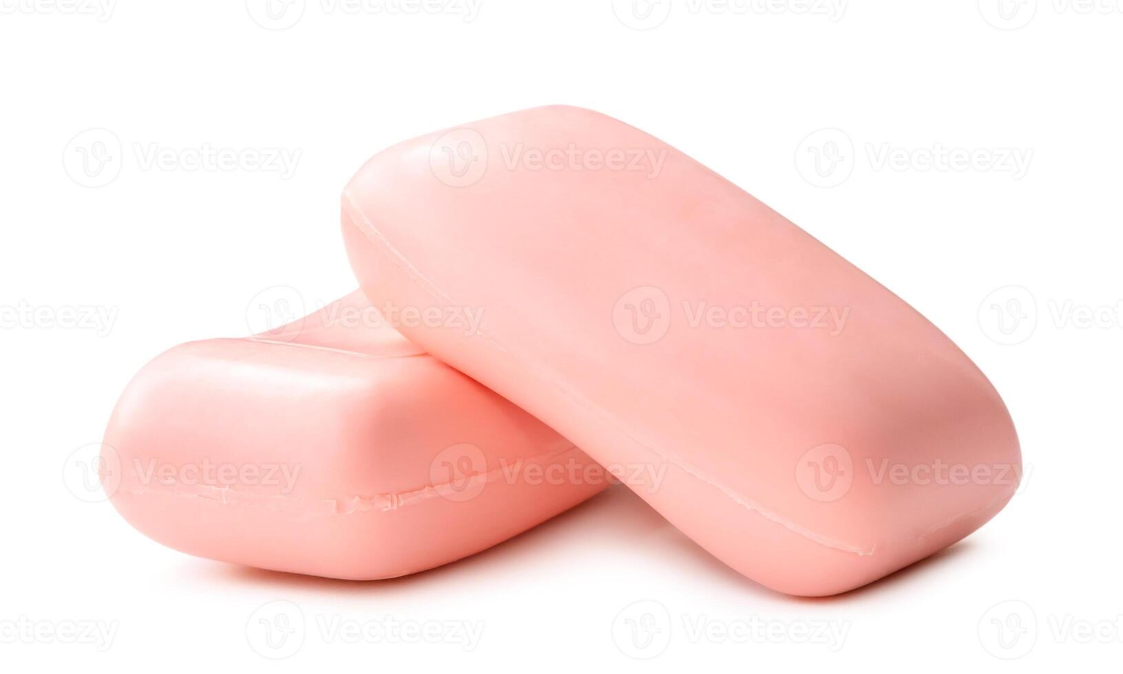 Two dry pink soap bars in stack isolated on white background with clipping path photo
