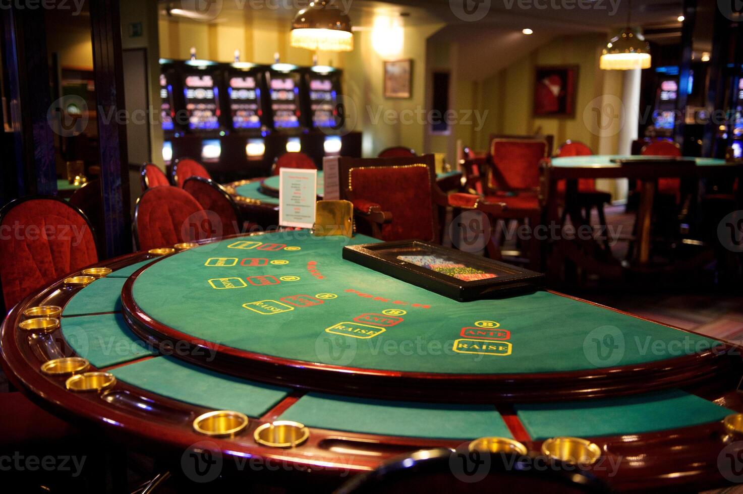 An empty blackjack table in a casino photo