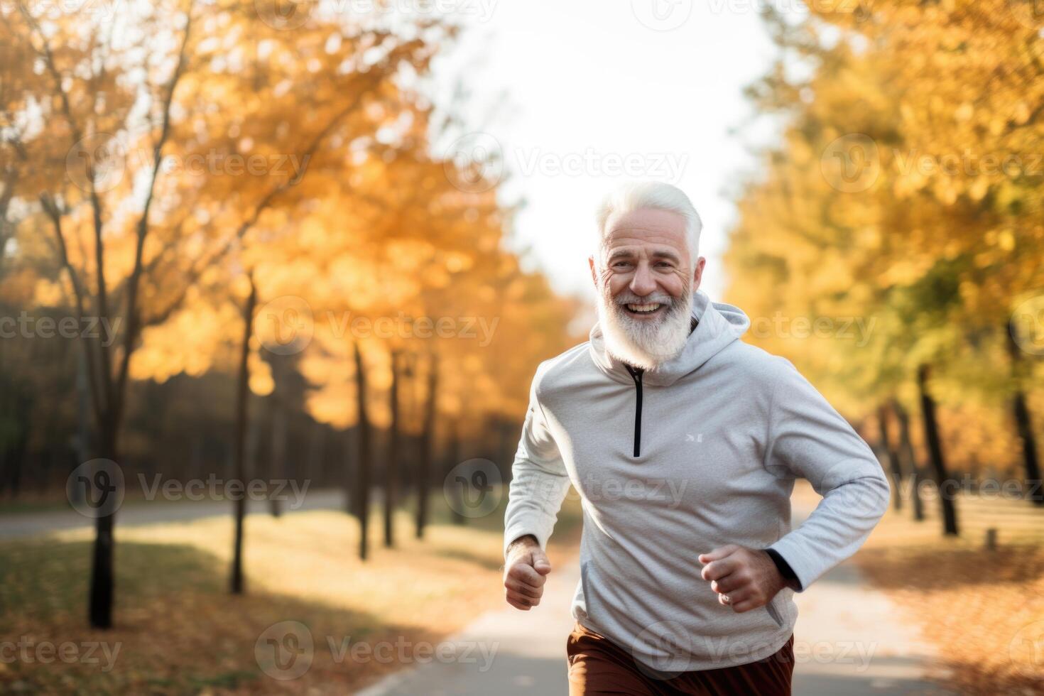 AI generated An elderly gray-haired man jogging in an autumn park photo
