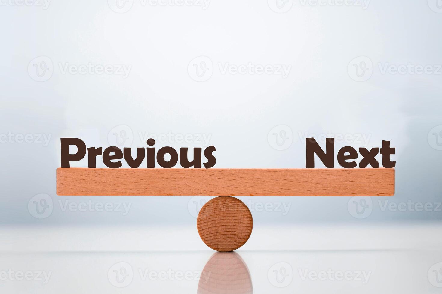 Previous vs Next word balancing on seesaw choice concept photo