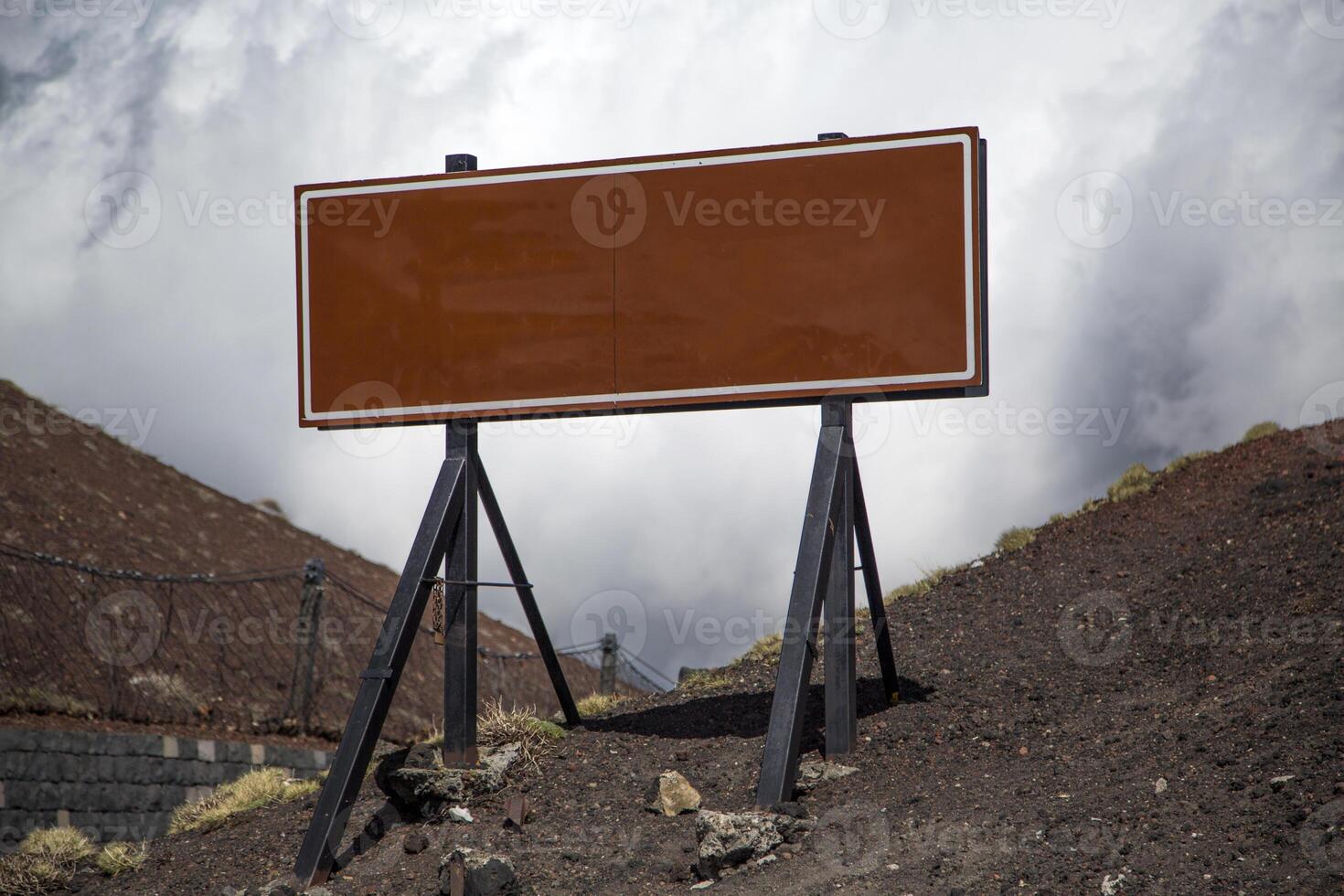 Empty sign on mountain photo