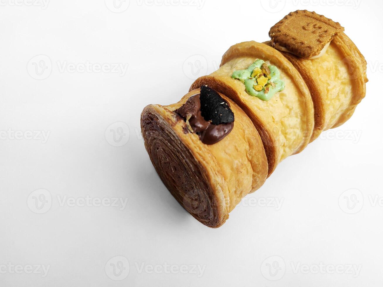 Cromboloni, New York Roll Croissant with a variety of sauce toppings, isolated white background. photo