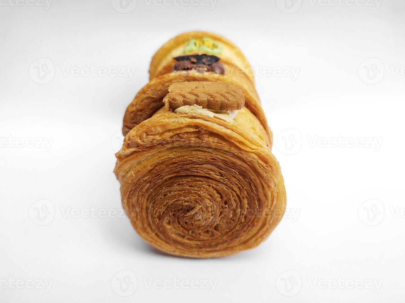 Cromboloni, New York Roll Croissant with a variety of sauce toppings, isolated white background. photo