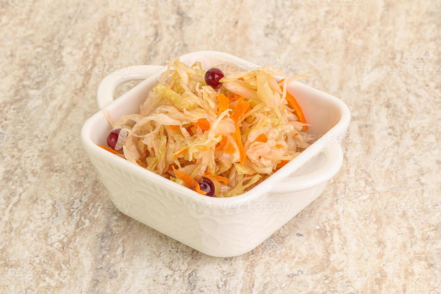 Fermented cabbage - sauerkraut in the bowl photo