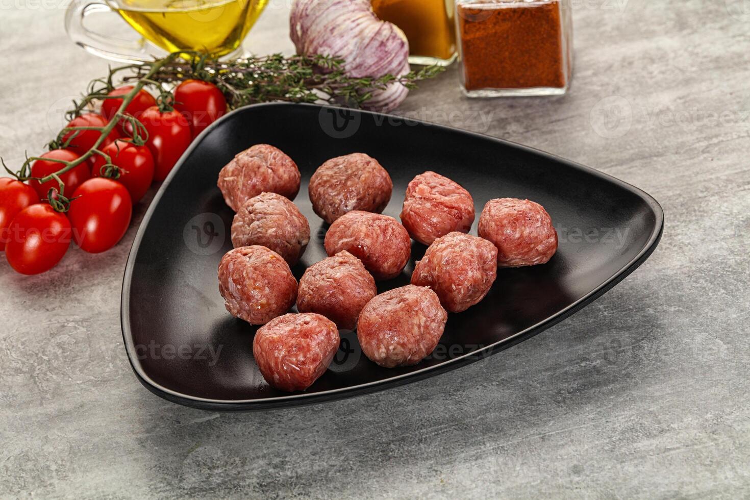 Uncooked raw beef meatball minced photo