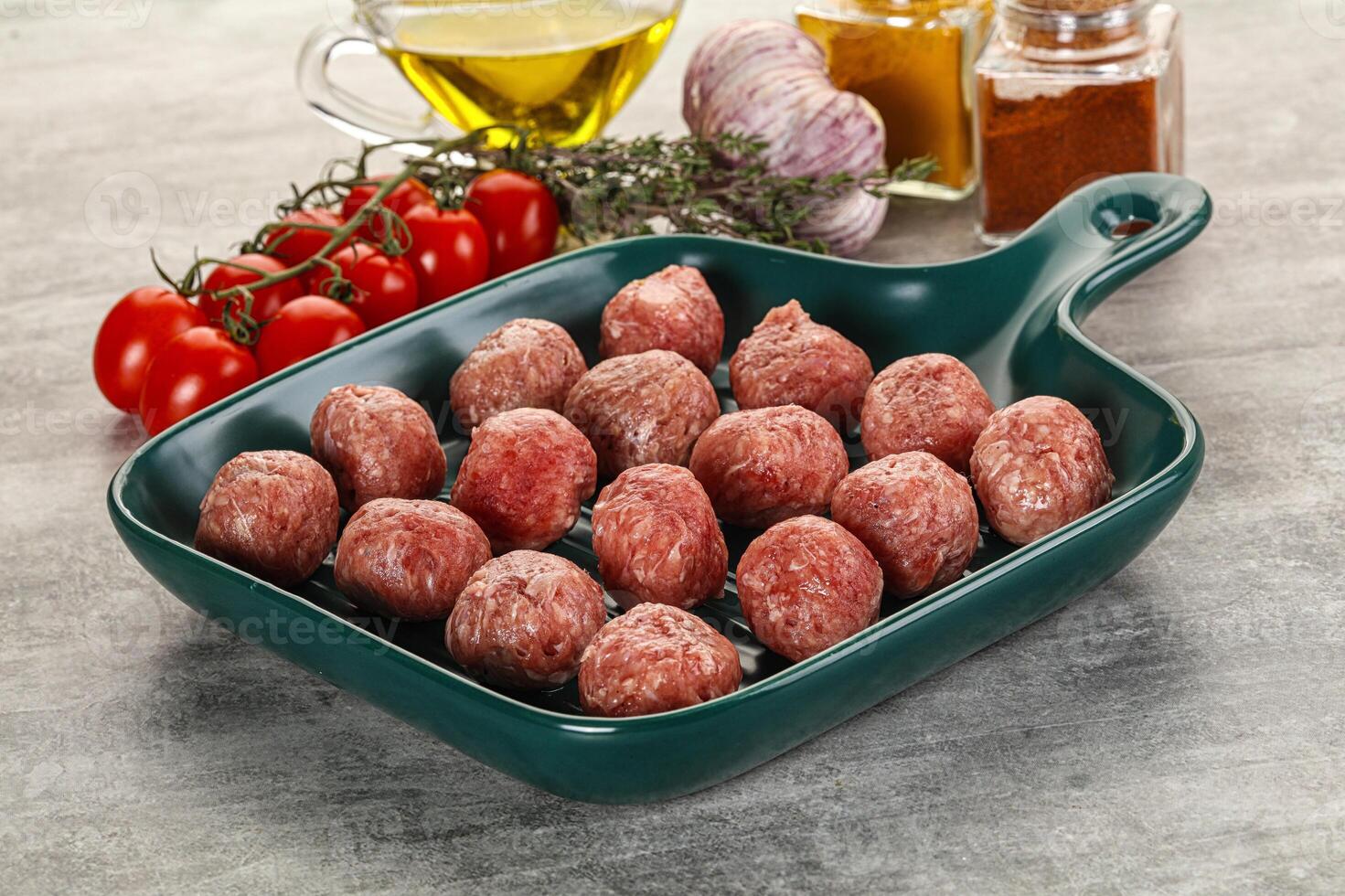Uncooked raw beef meatball minced photo
