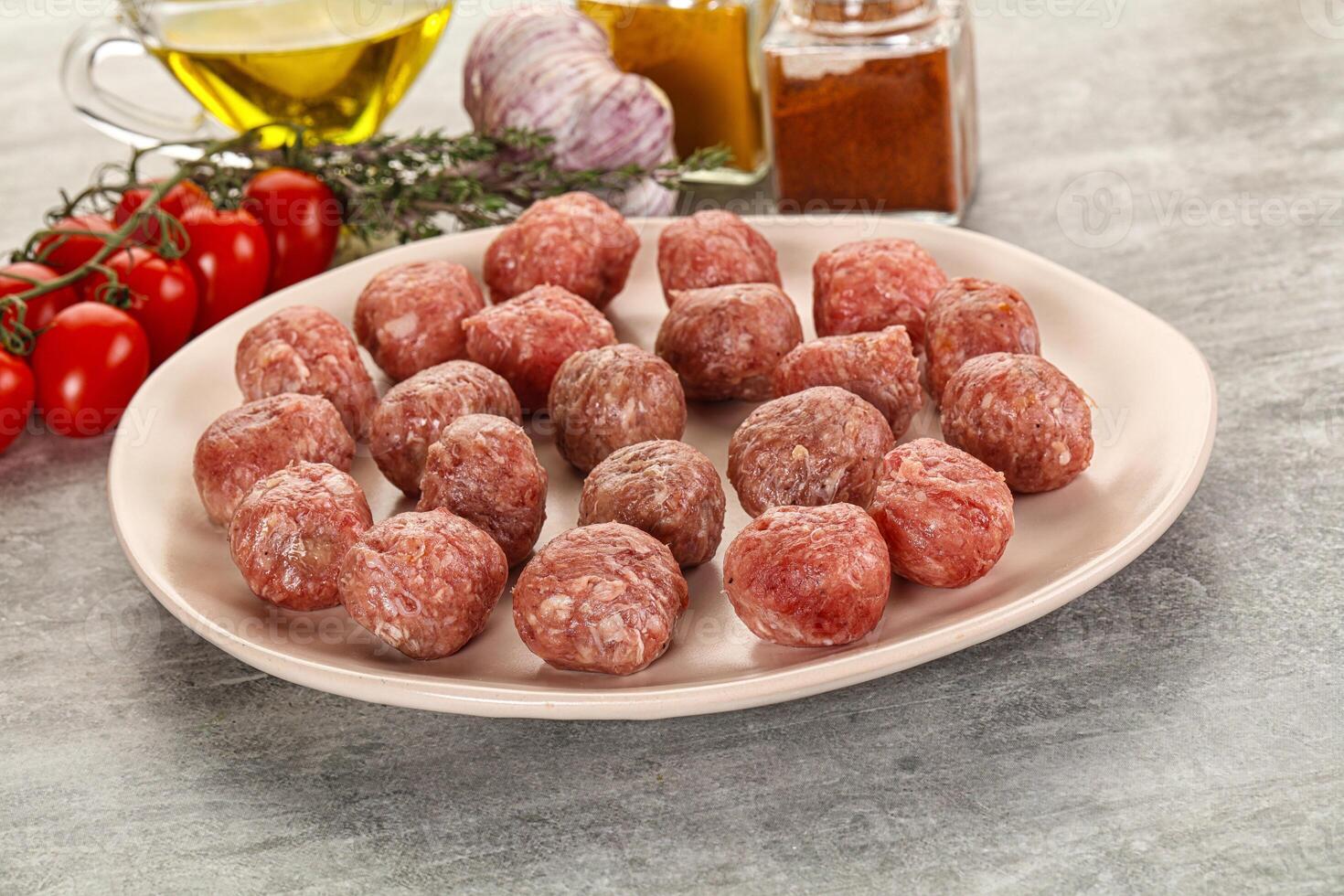 Uncooked raw beef meatball minced photo