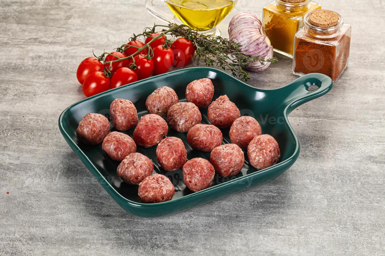 Uncooked raw beef meatball minced photo