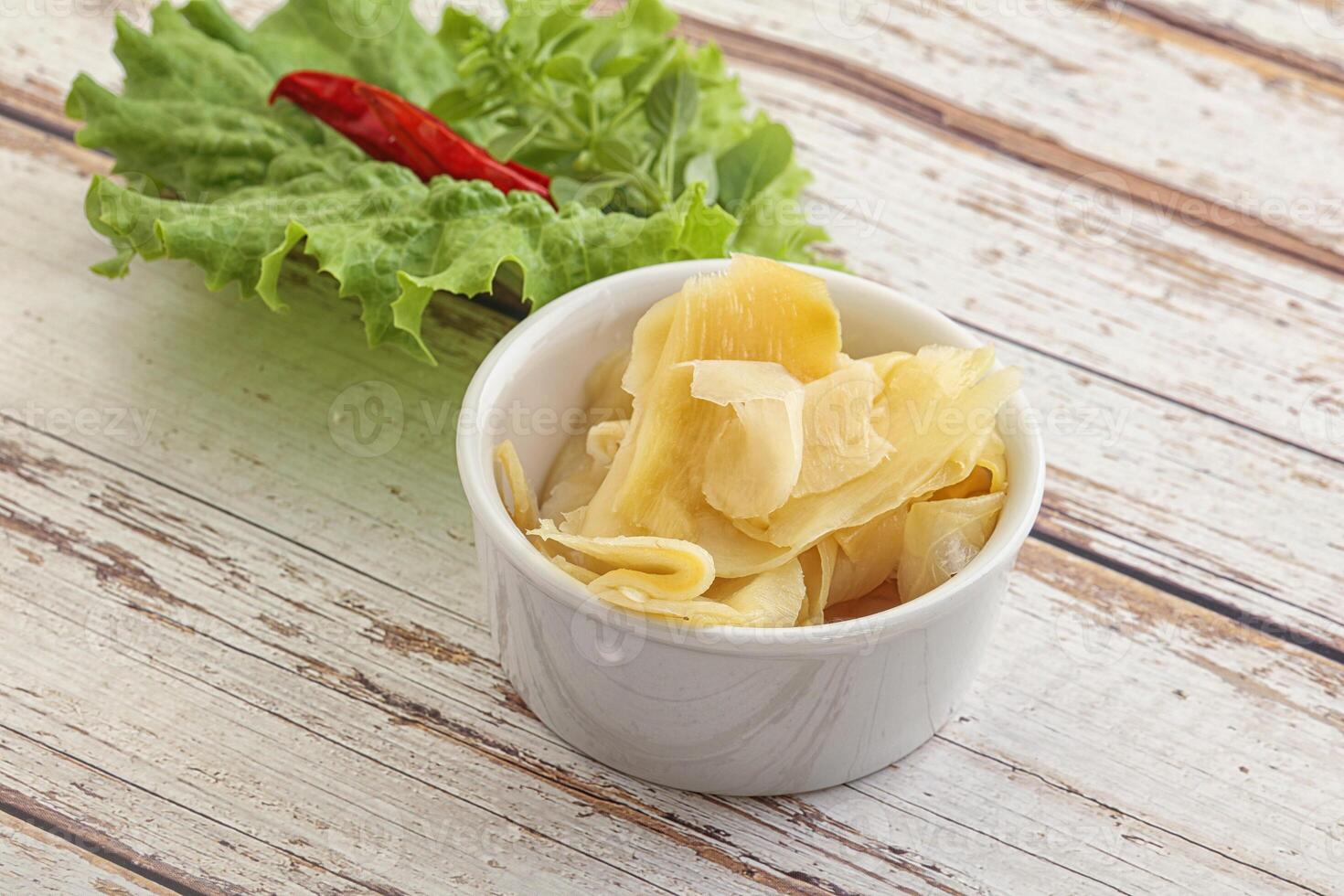 Marinated white ginger in the bowl photo