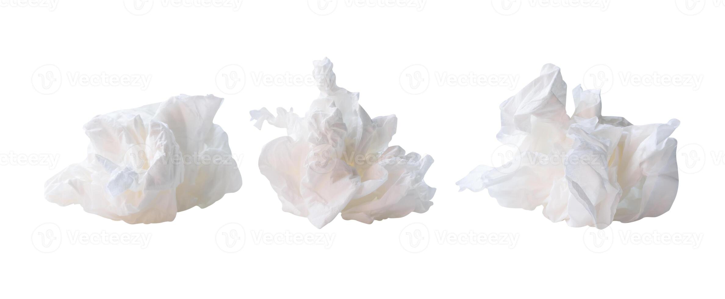 Front view of white screwed or crumpled tissue paper or napkin in set and strange shape after use in toilet or restroom isolated on white background with clipping path photo