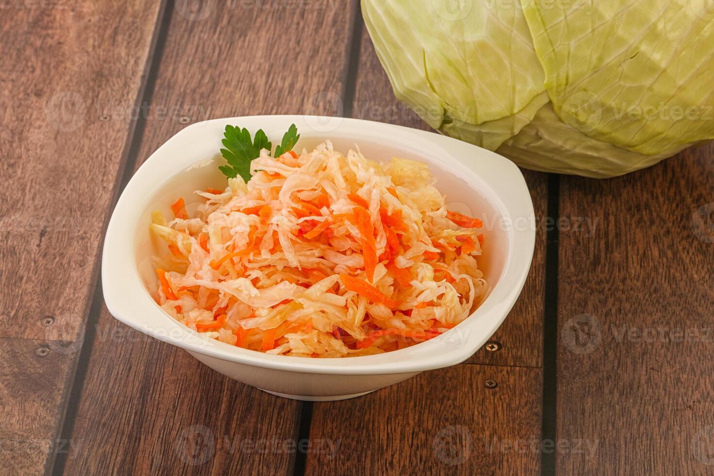 Sauerkraut - pickled cabbage in the bowl photo