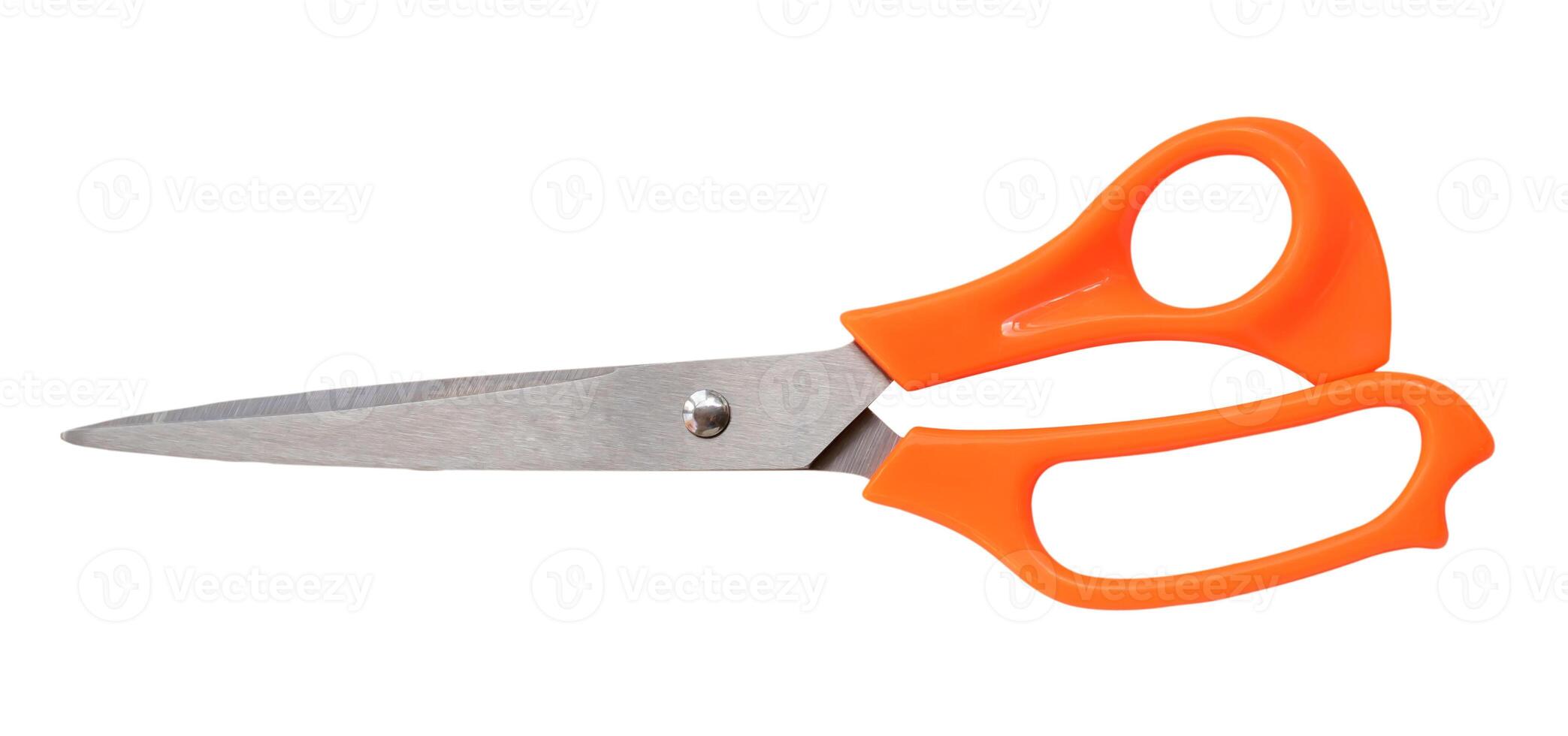 Top view of multipurpose scissors with orange handle isolated on white background with clipping path photo