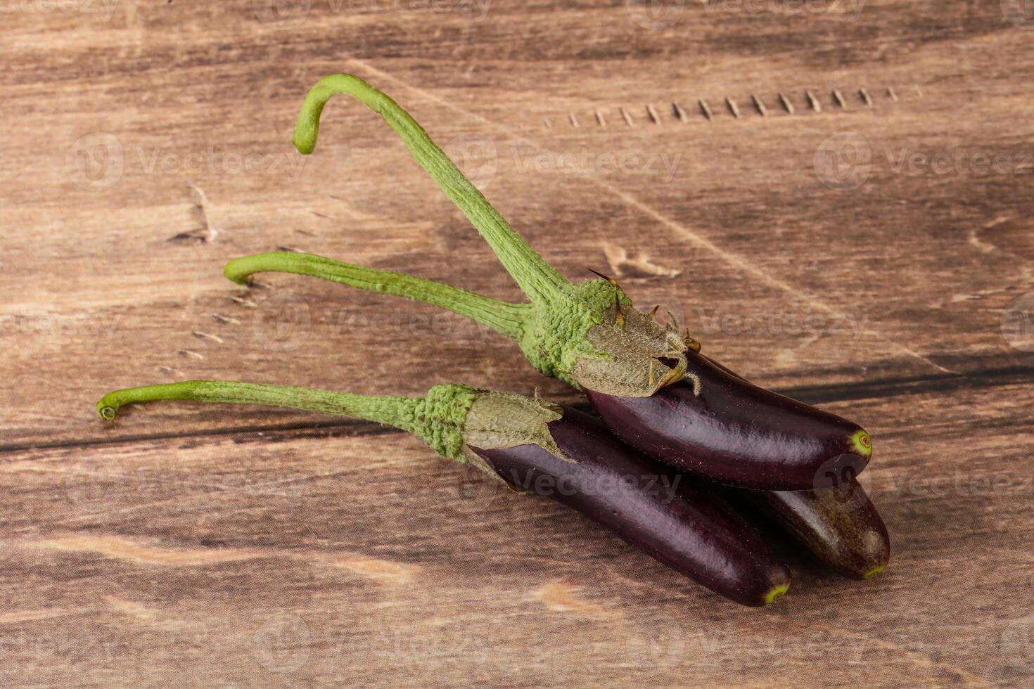 Baby organic purple eggplant heap photo