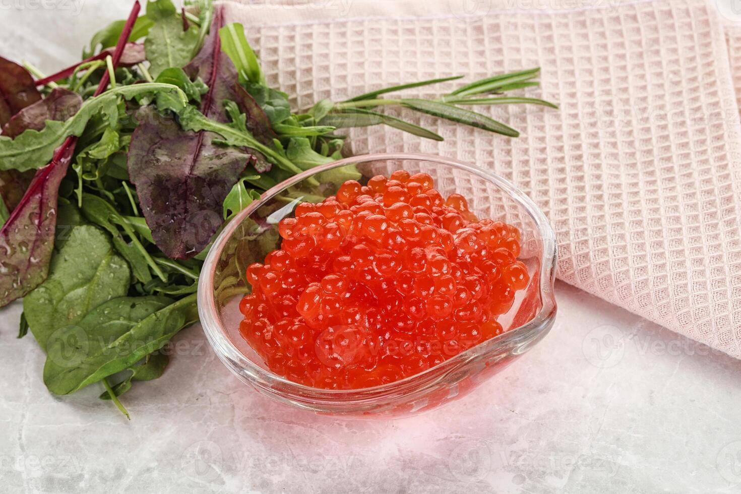 Red caviar in the bowl photo