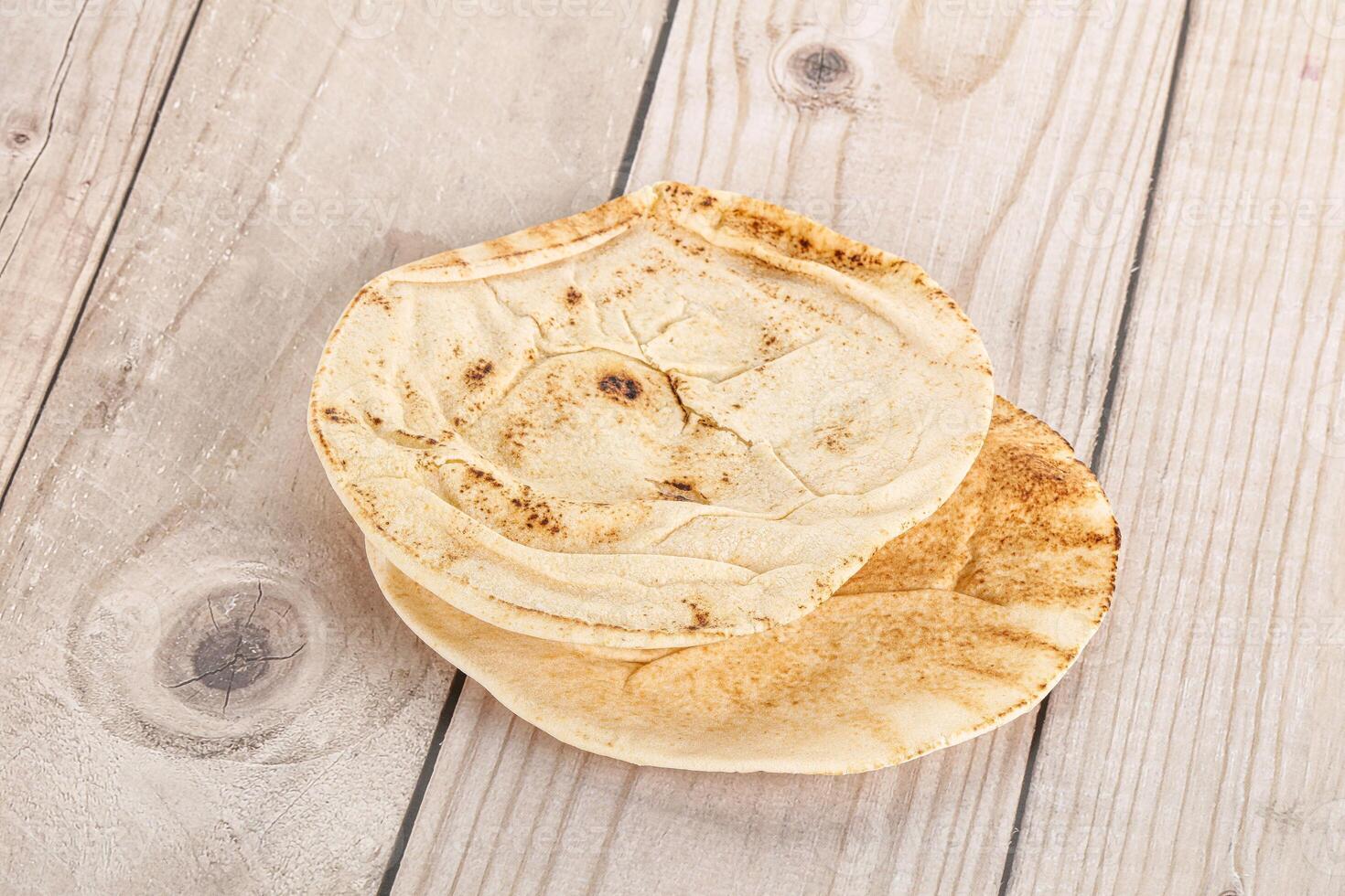 Traditional eastern round pita bread photo