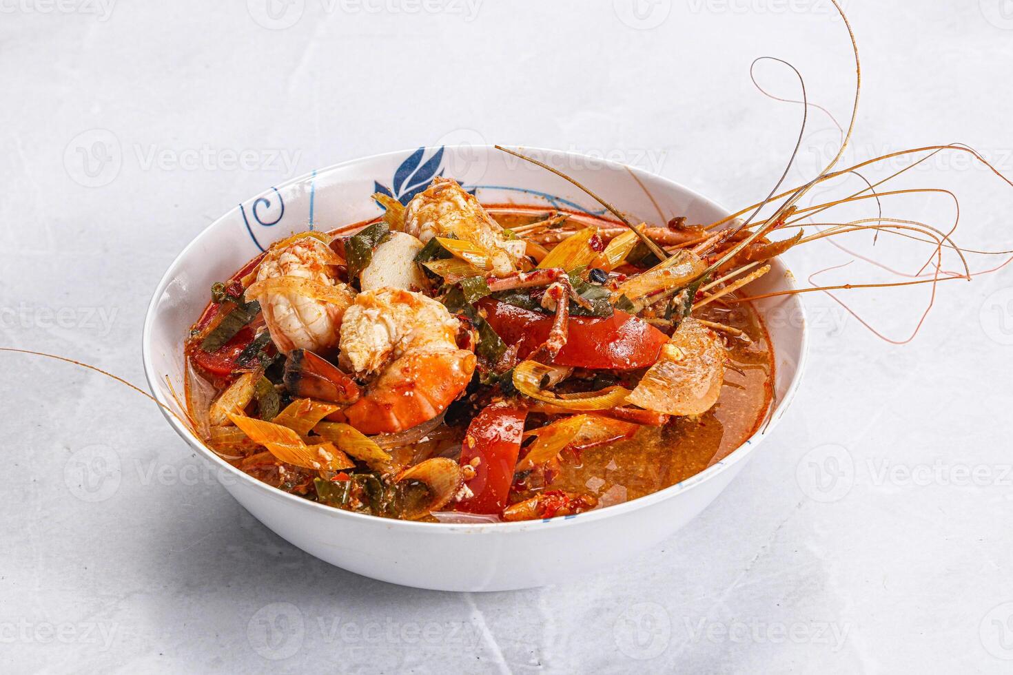 Thai traditional Tom Yum soup photo