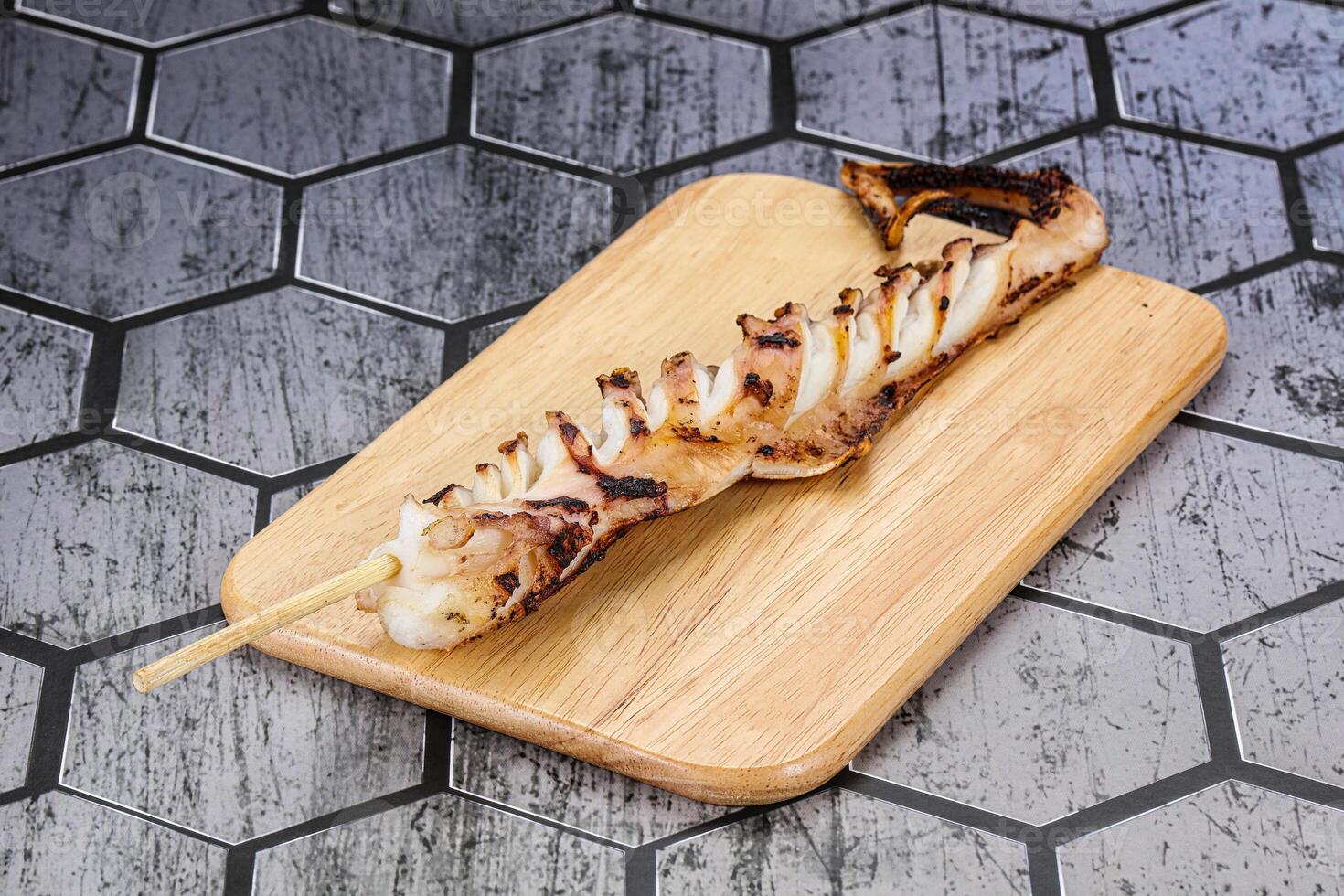 Delicous tasty Grilled octopus tentacle photo
