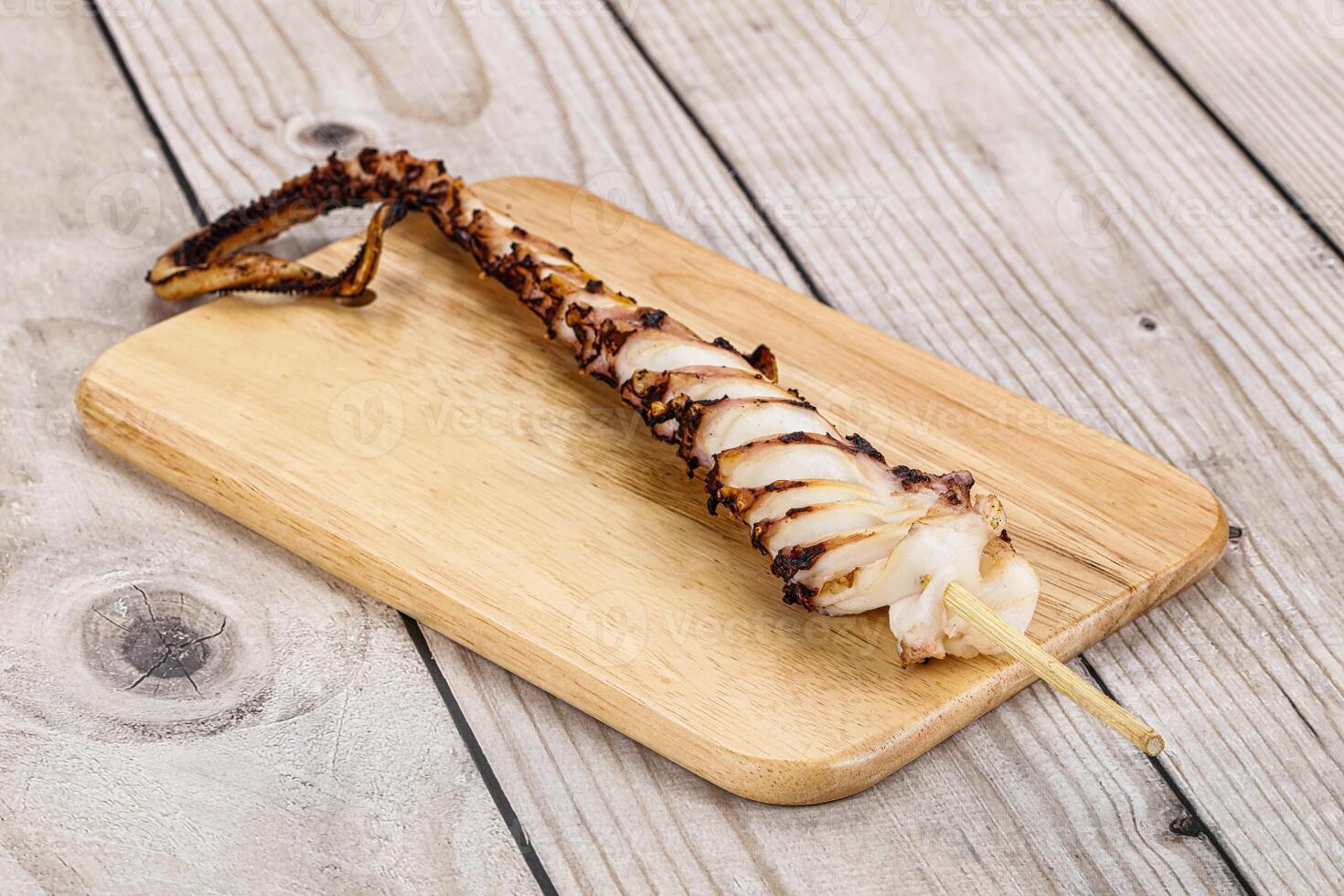 Delicous tasty Grilled octopus tentacle photo