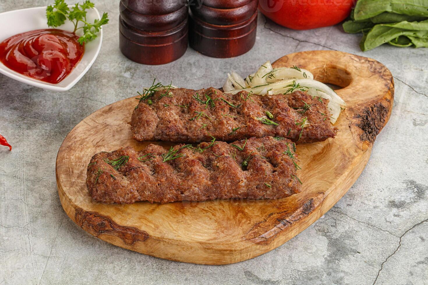 Kebab with beef served onion photo