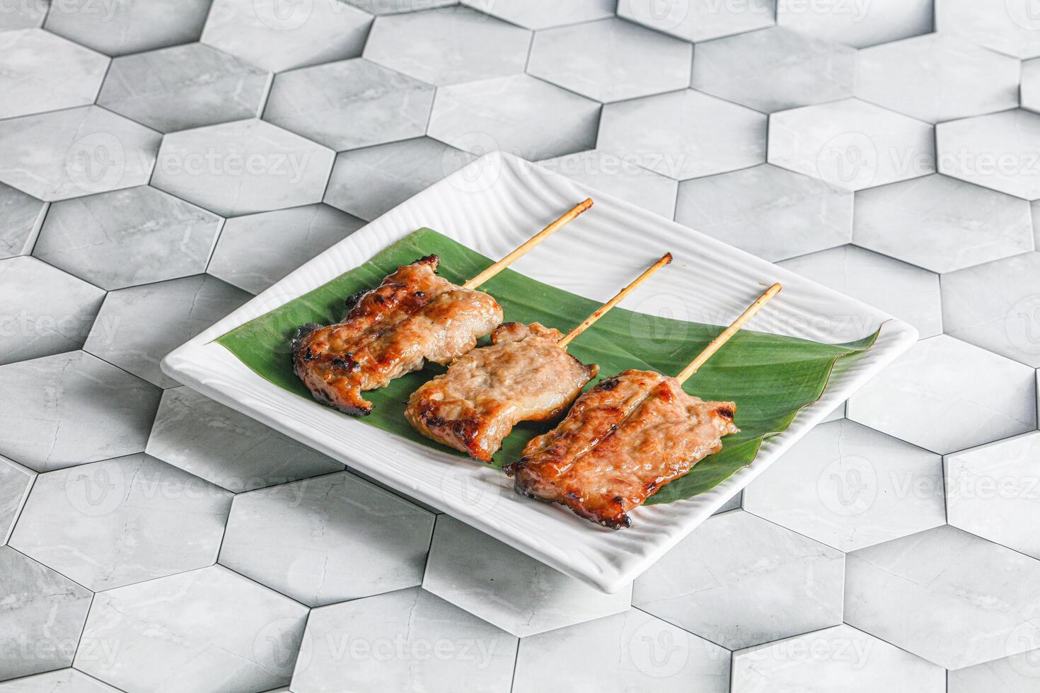 Thai cuisine - grilled pork skewer photo