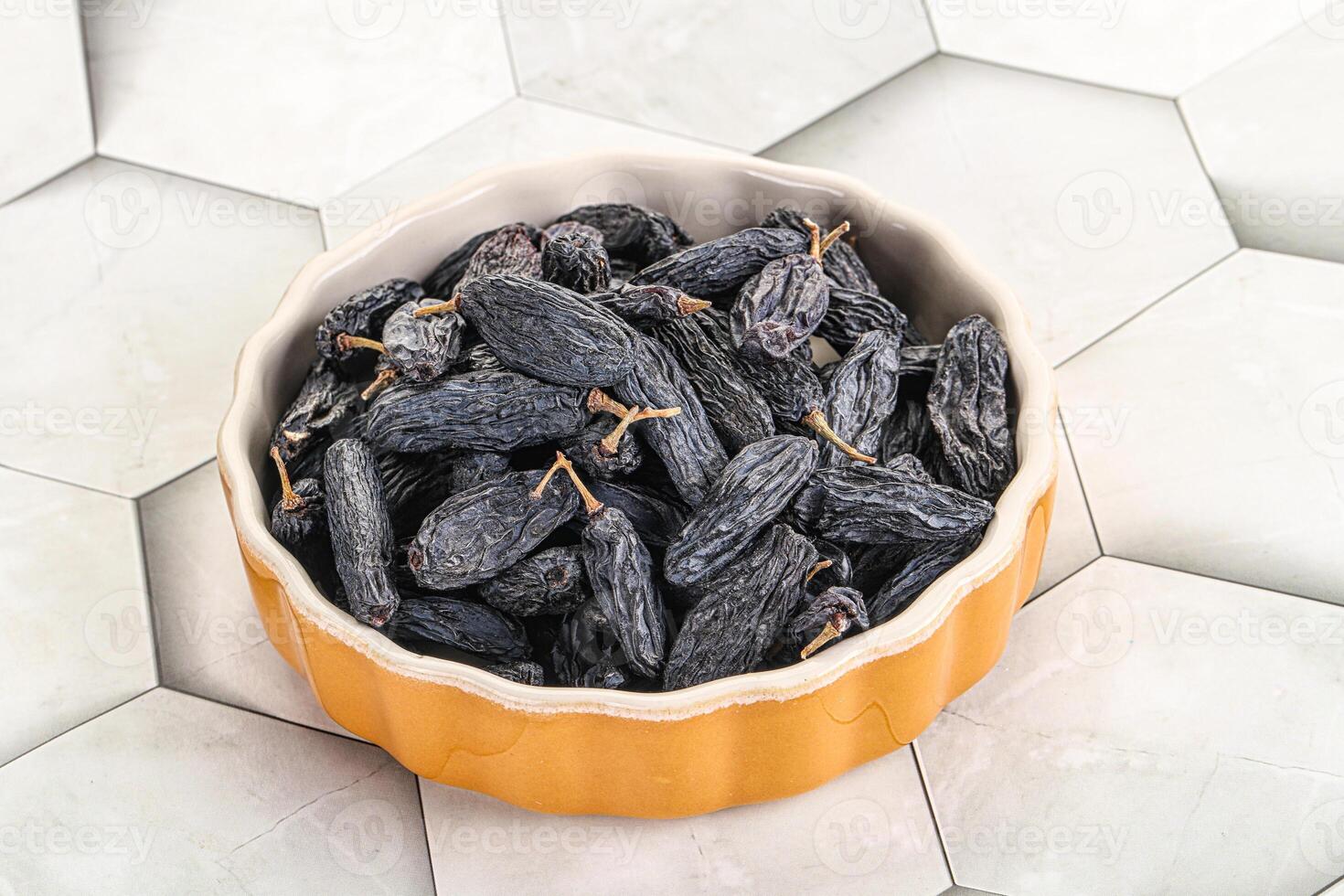 Blue raisin - dry grape berries photo