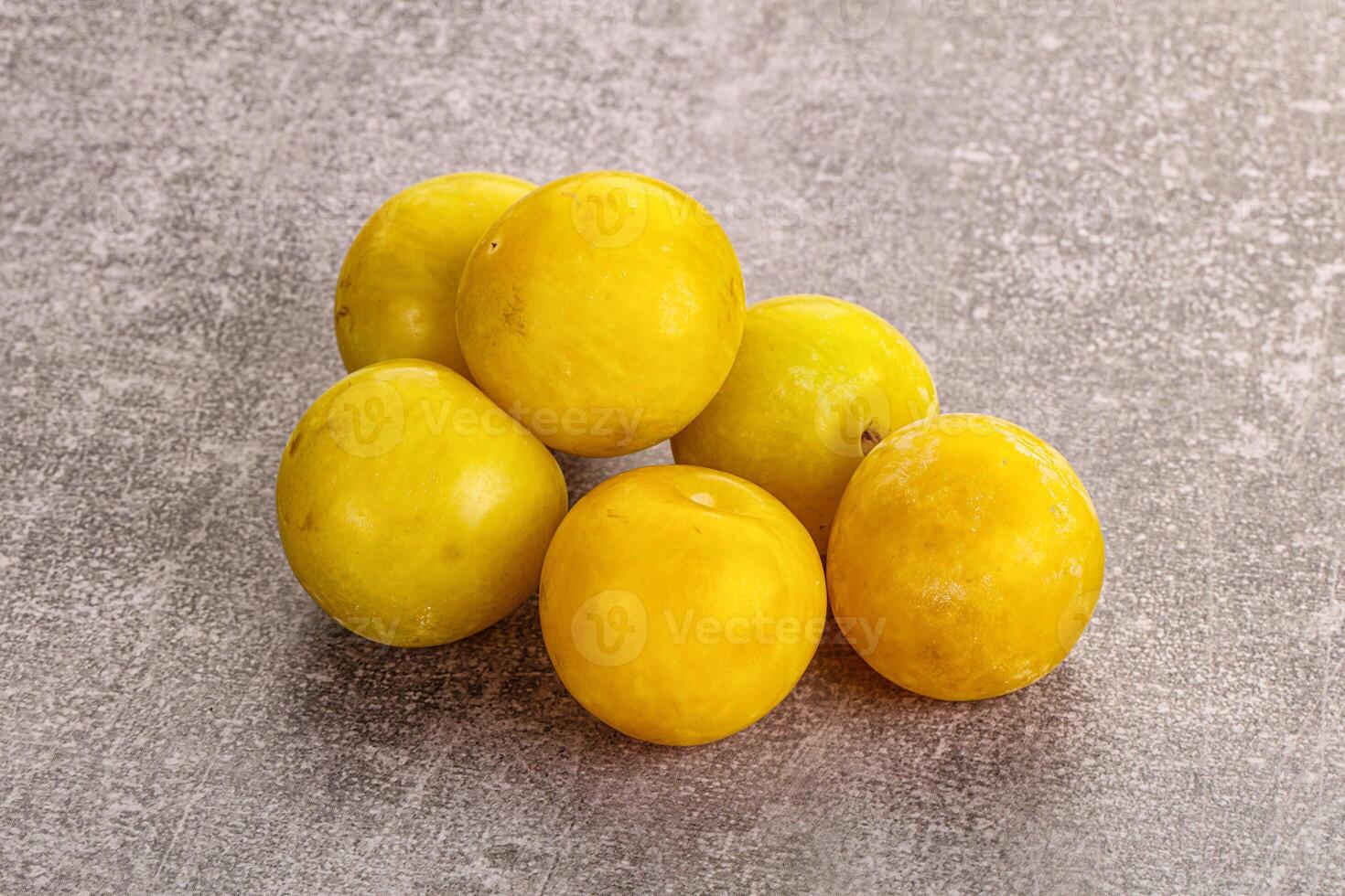 Yellow sweet plum heap fruit photo