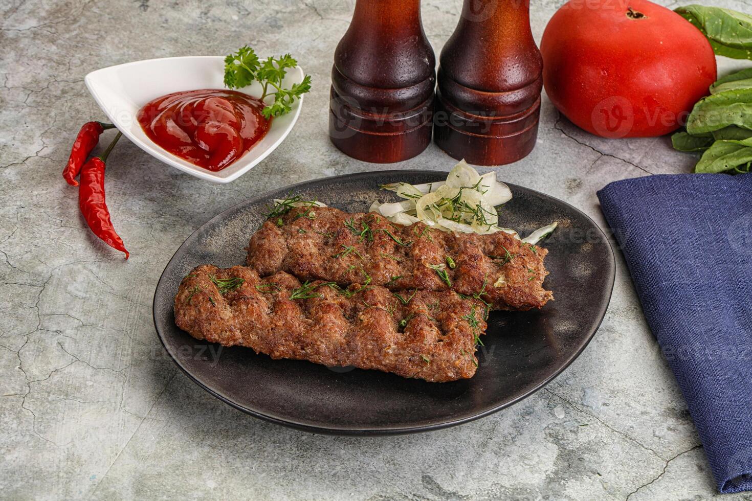 Kebab with beef served onion photo