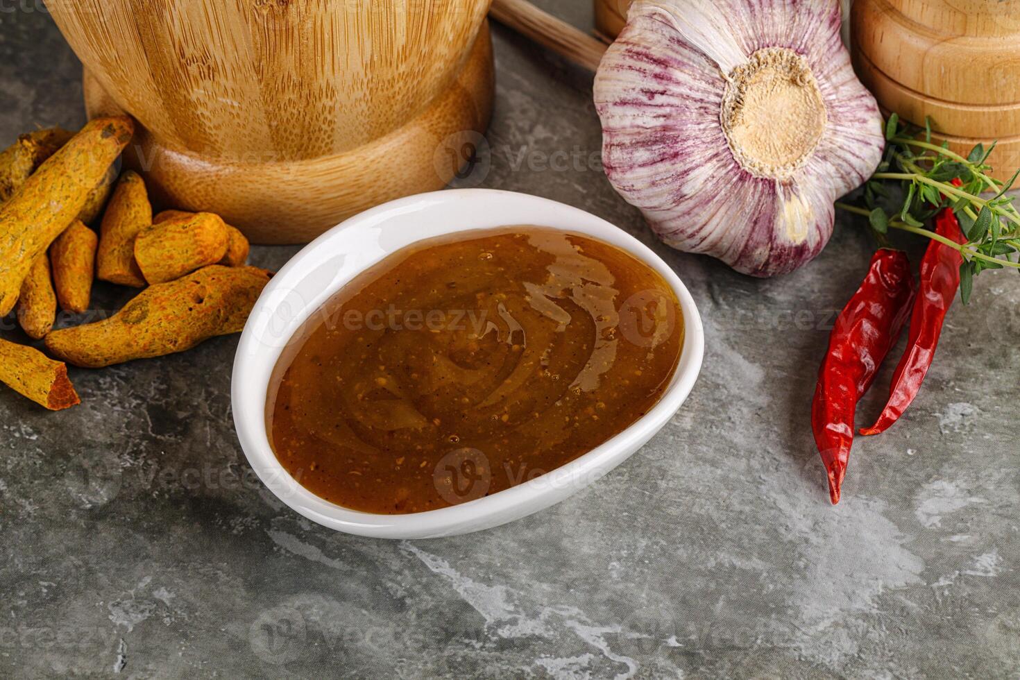 Indian curry sauce in the bowl photo