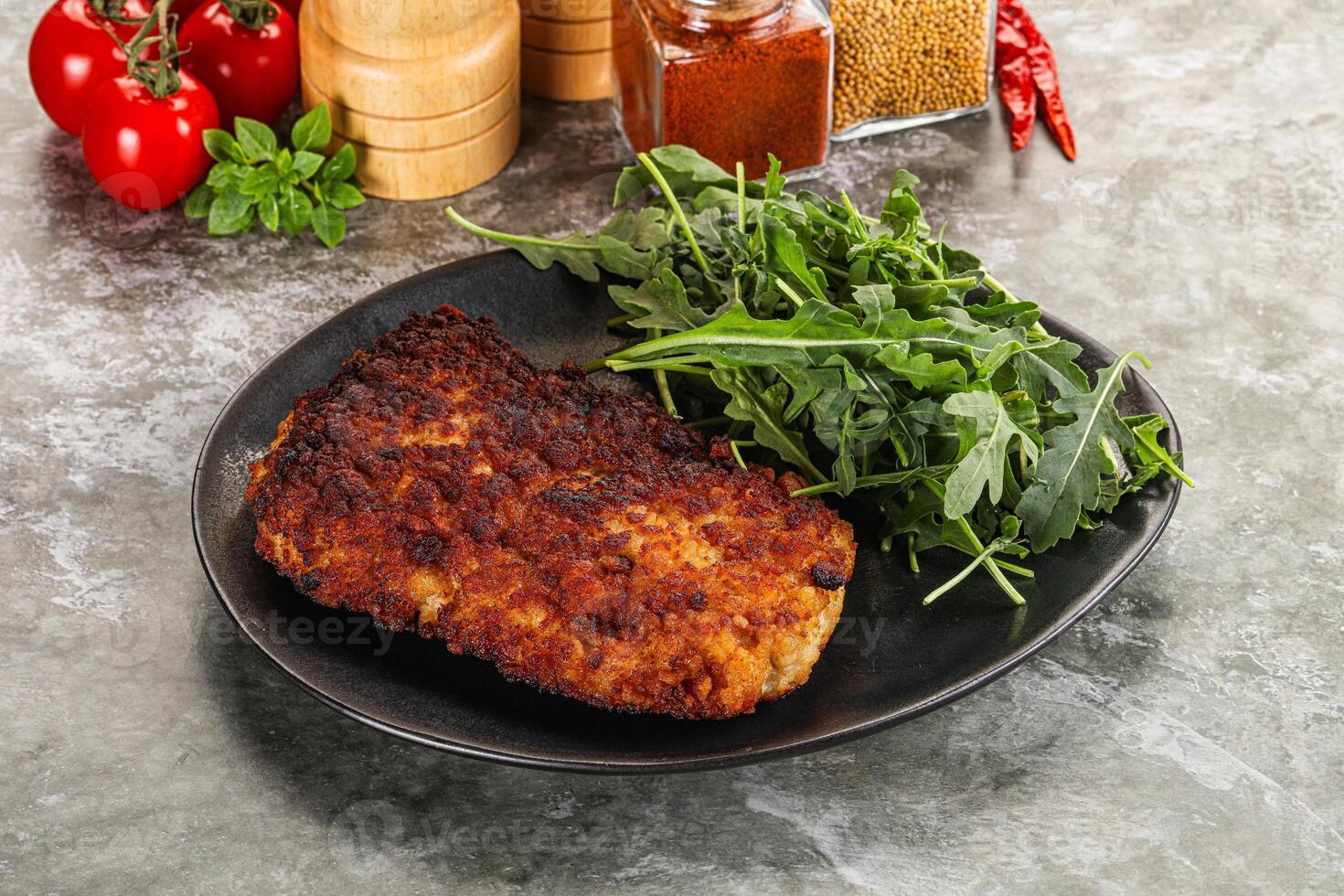 Tasty roasted breaded meat schnitzel photo