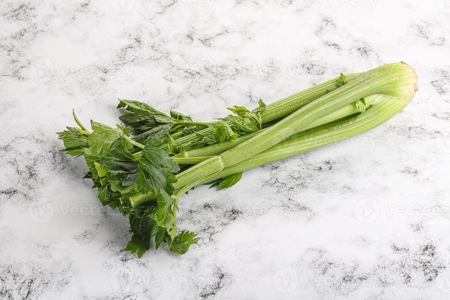 Vegan cuisine - celery stems with leaf photo