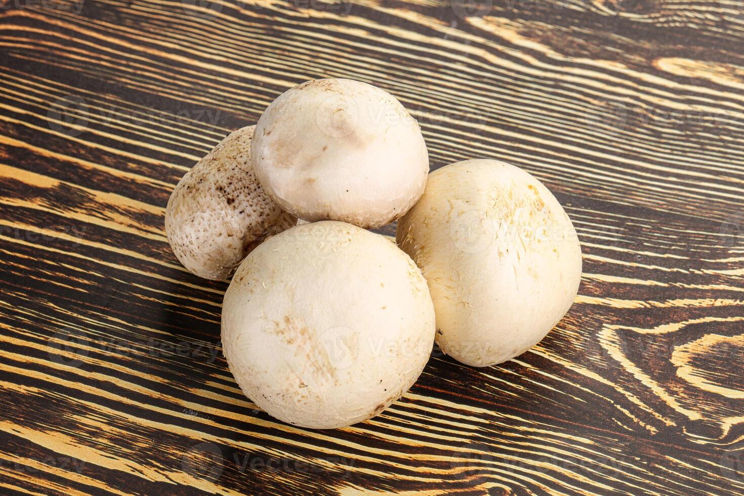 Natural organic ripe champignon mushrooms photo