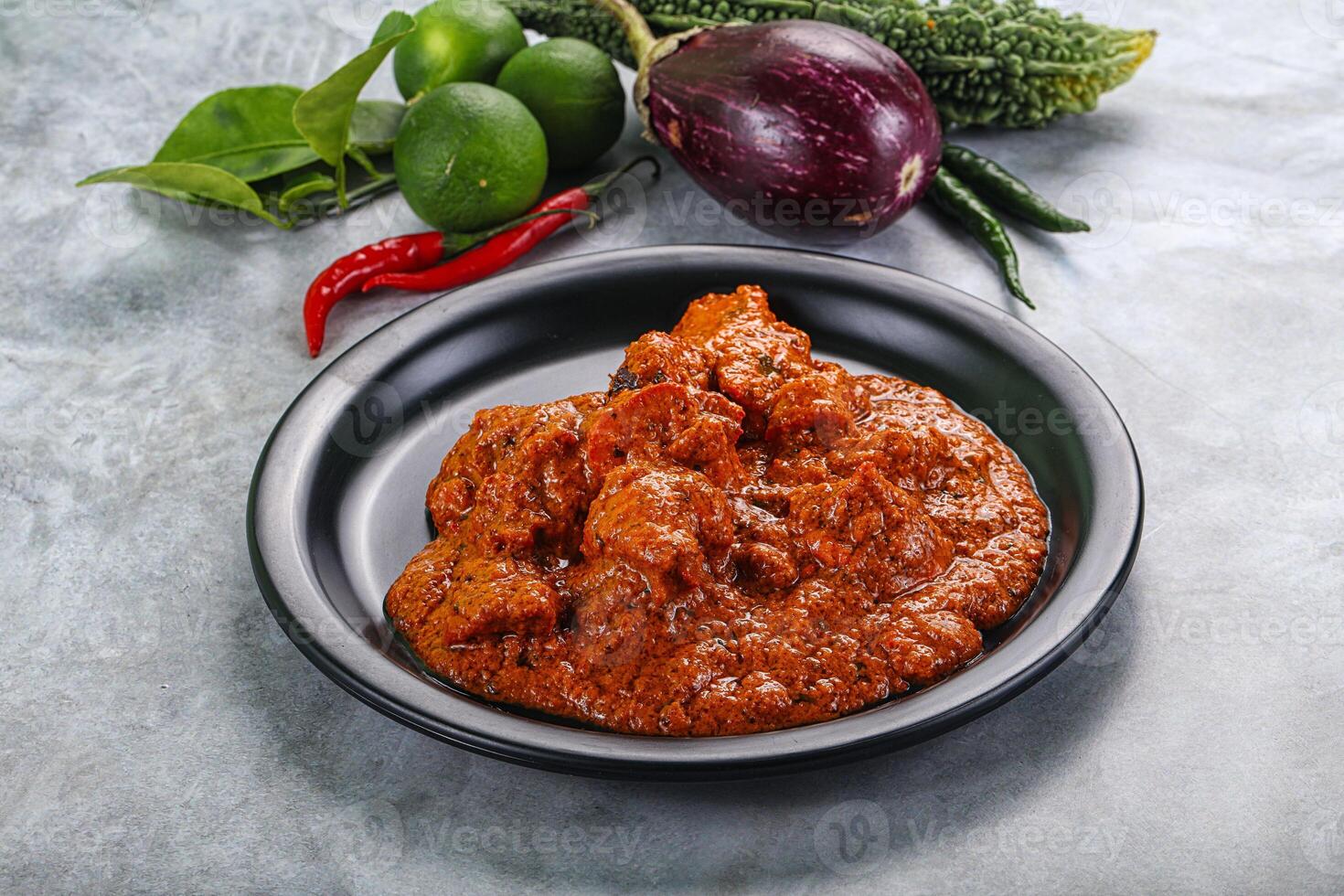 Indian cuisine - butter chicken with sauce photo