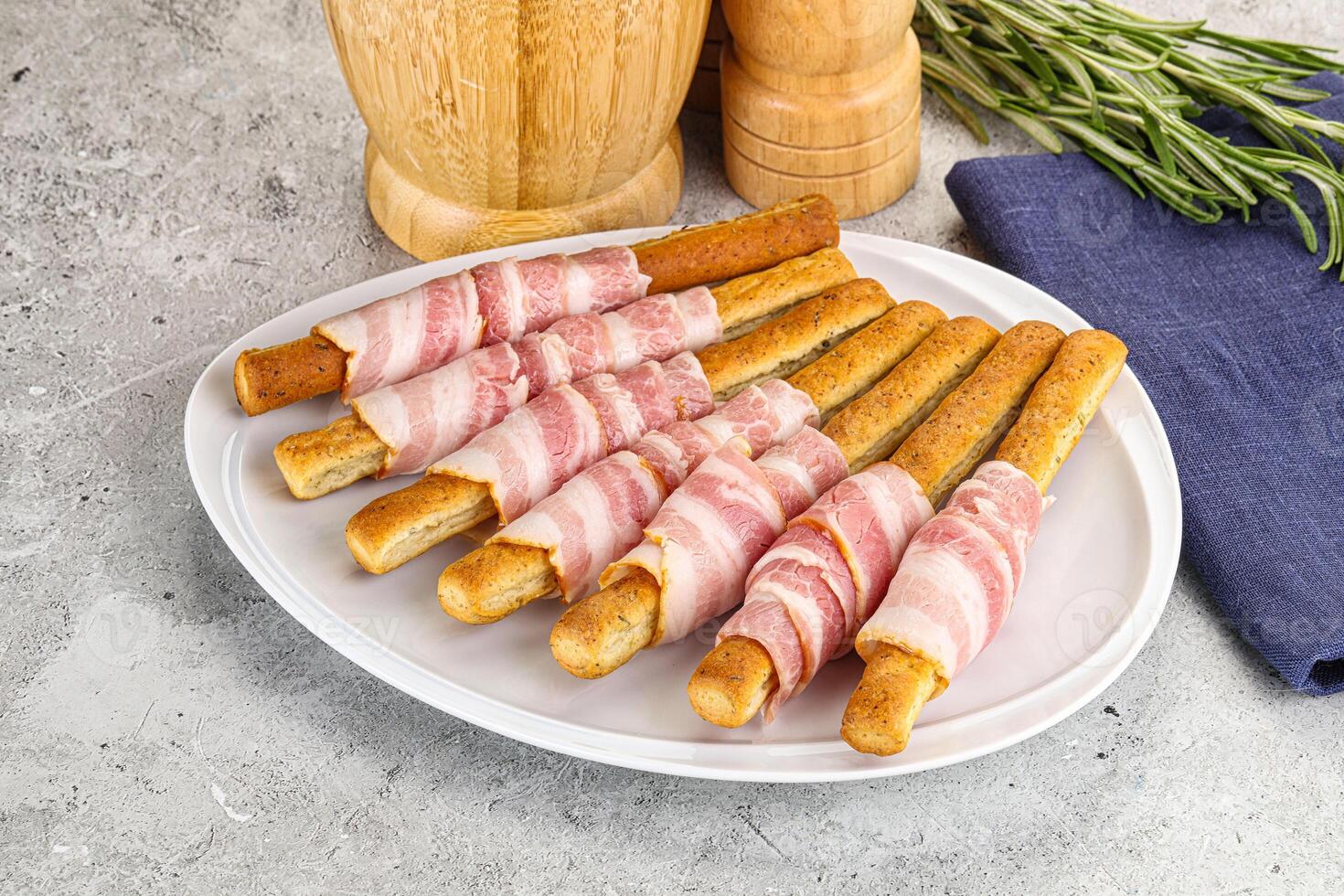 Crispy grissini italian bread with bacon photo