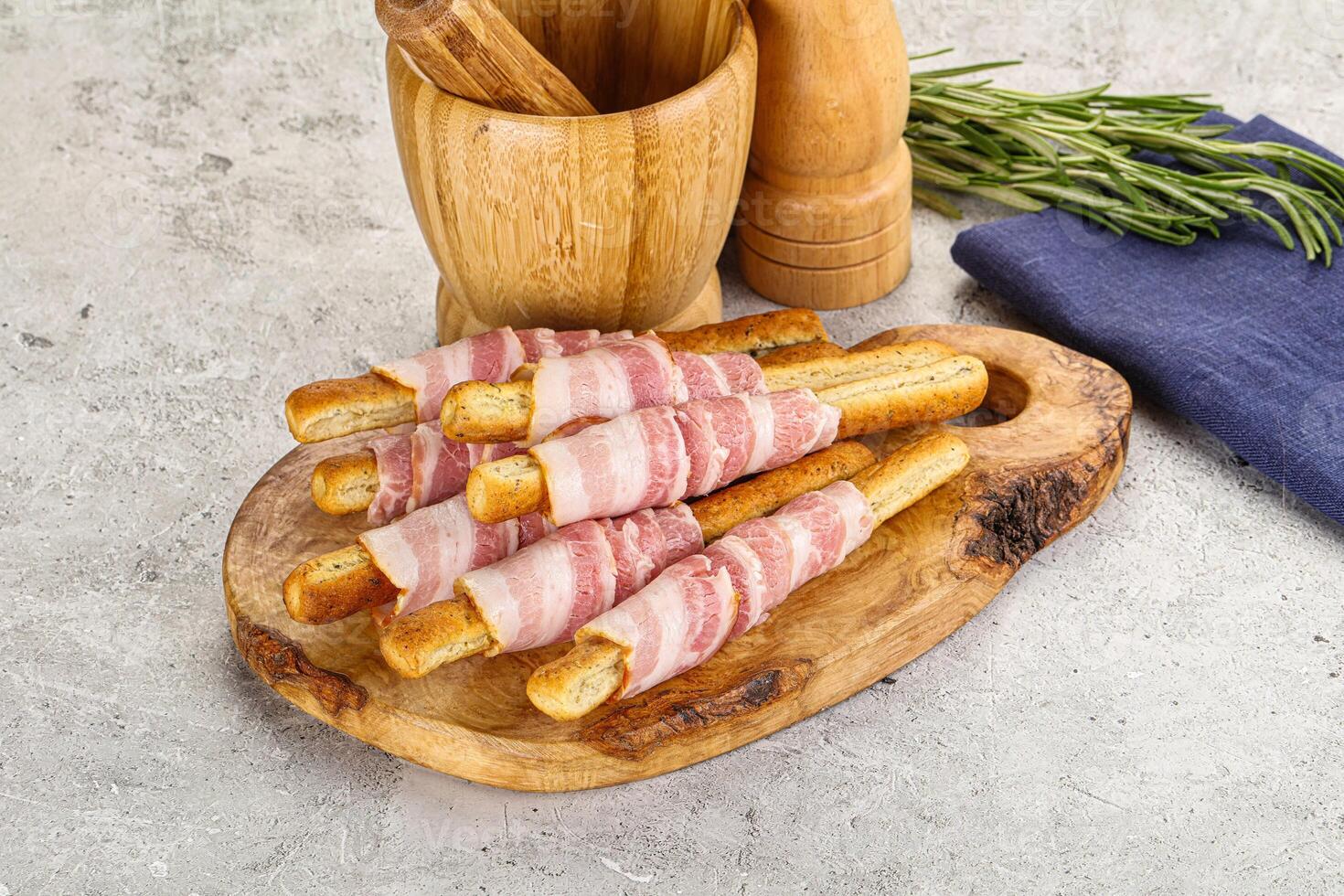 Crispy grissini italian bread with bacon photo