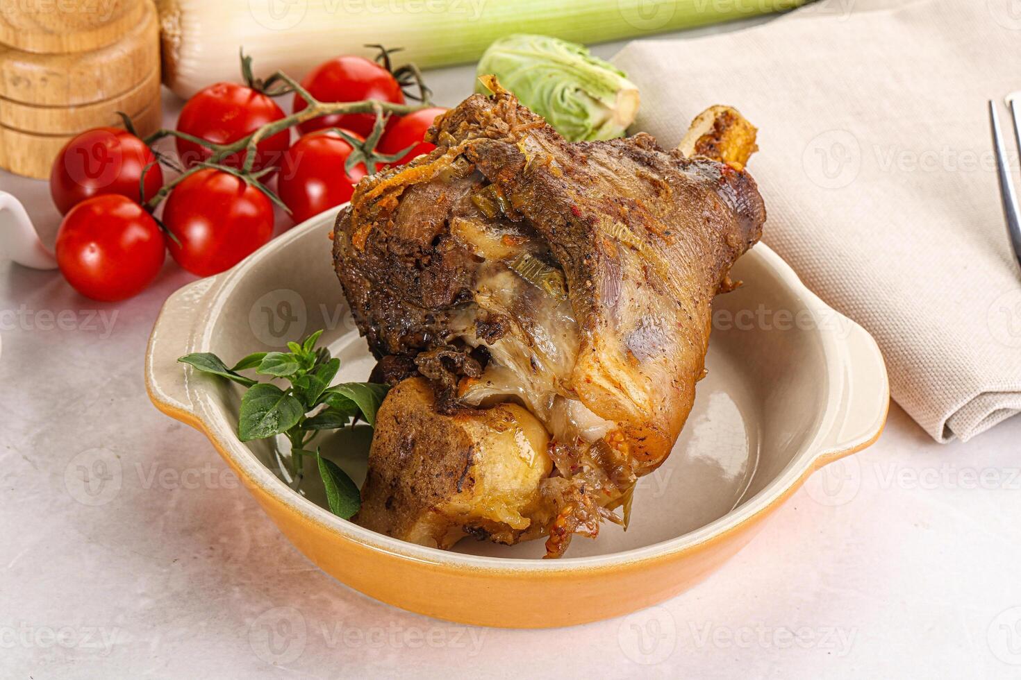 Baked Lamb shank with bone photo
