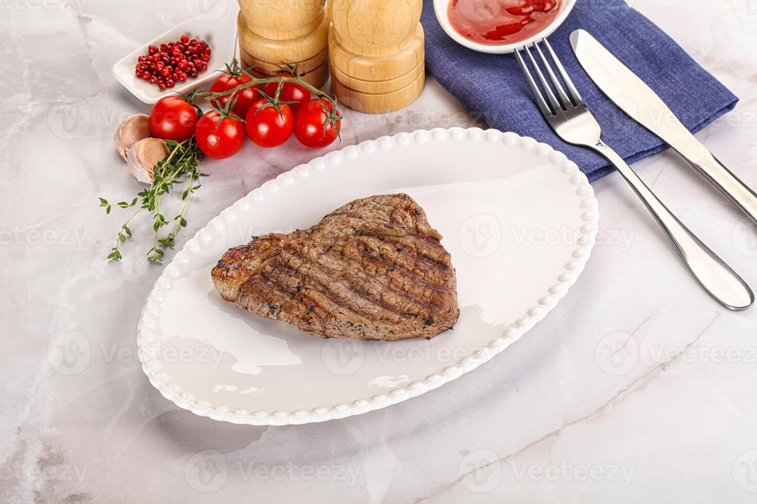 Grilled marble beef steak with sauce photo