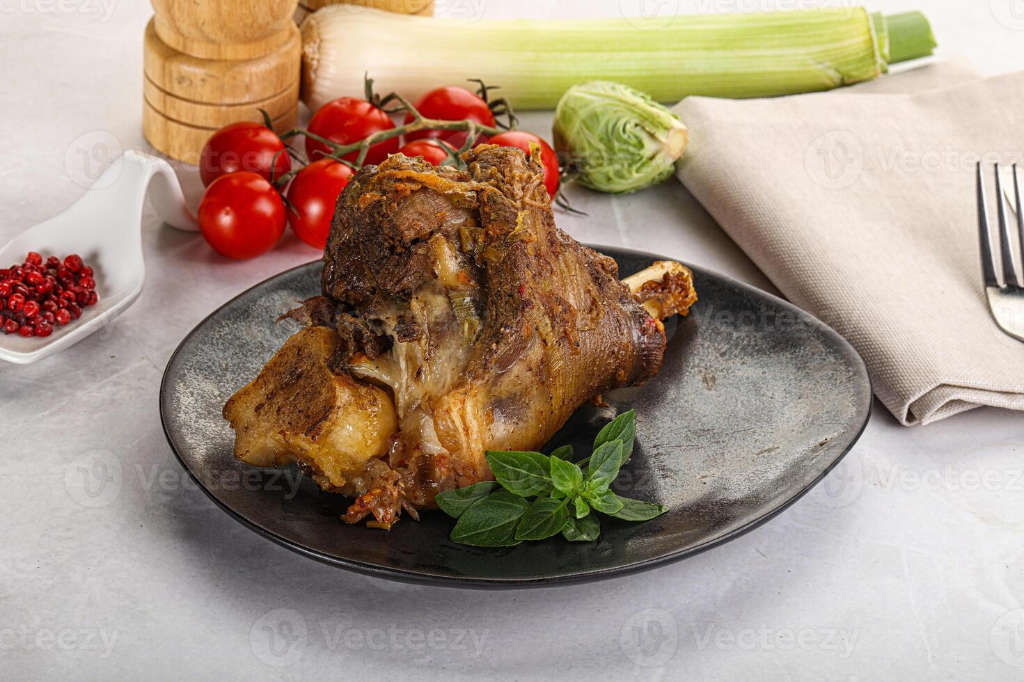 Baked Lamb shank with bone photo