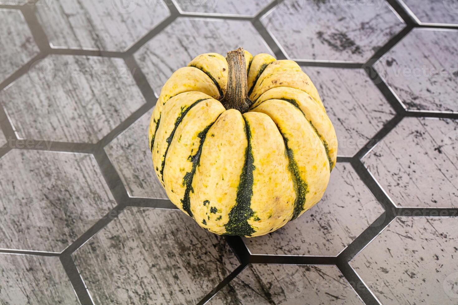 Ripe raw fresh decorative pumpkin photo