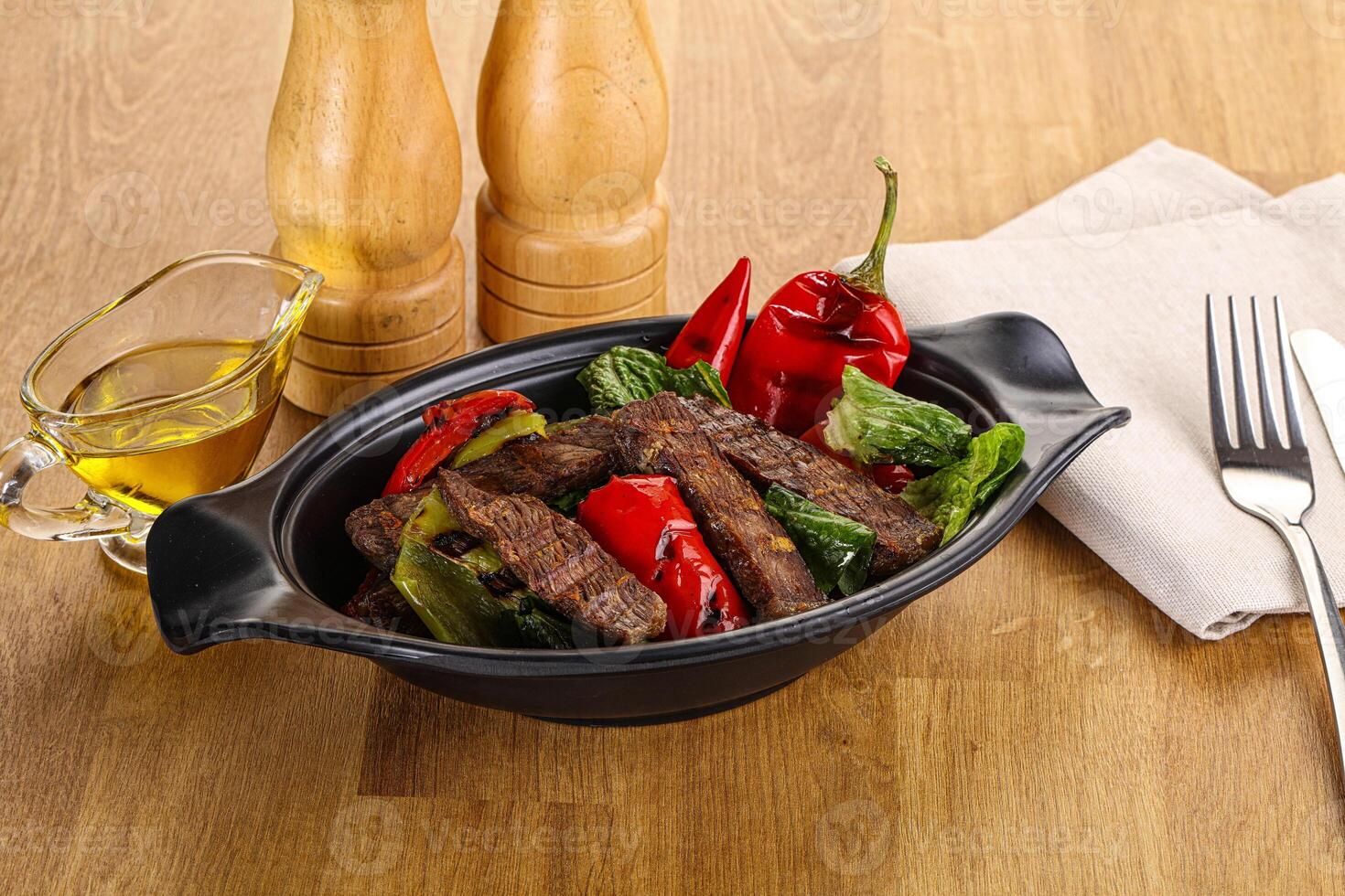 Salad with grilled beef steak photo