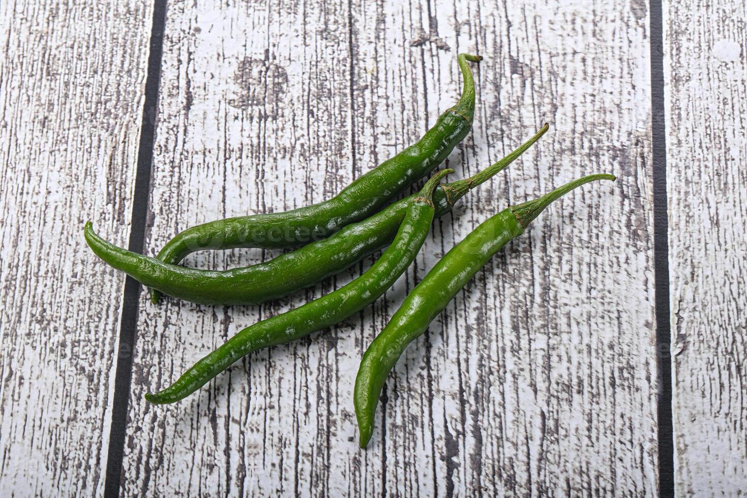 Hot and spicy green chili pepper photo