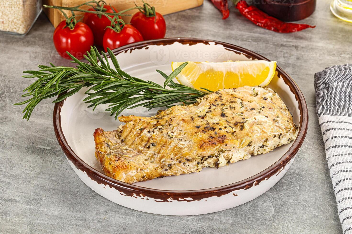 Baked salmon fish served rosemary photo