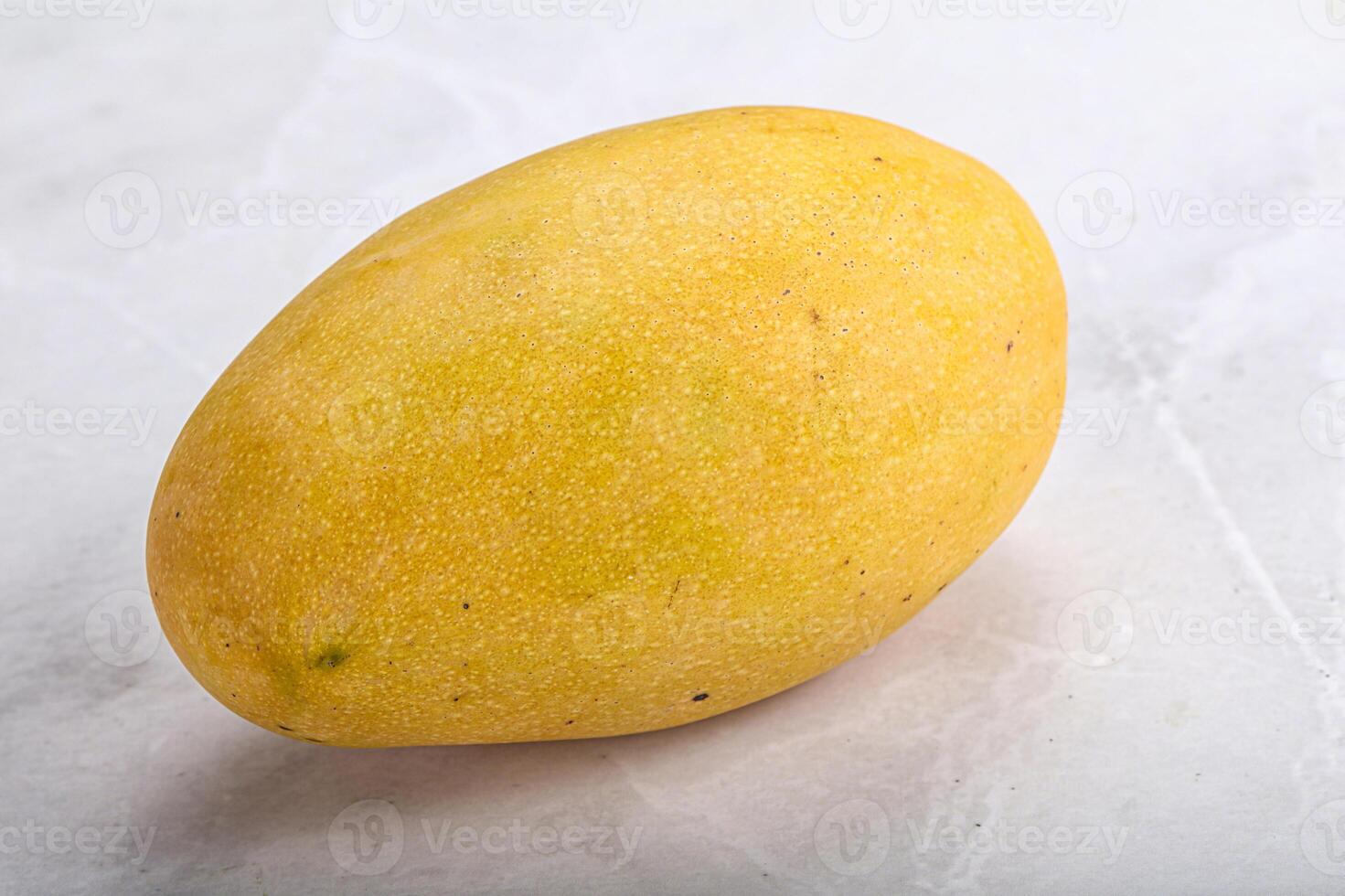 Sweet ripe juicy tropical mango fruit photo