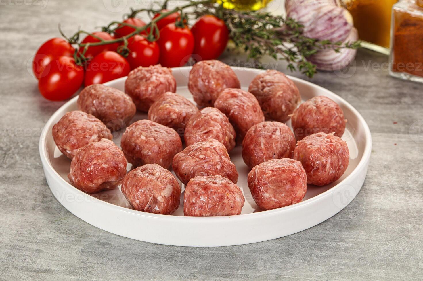 Uncooked raw beef meatball minced photo
