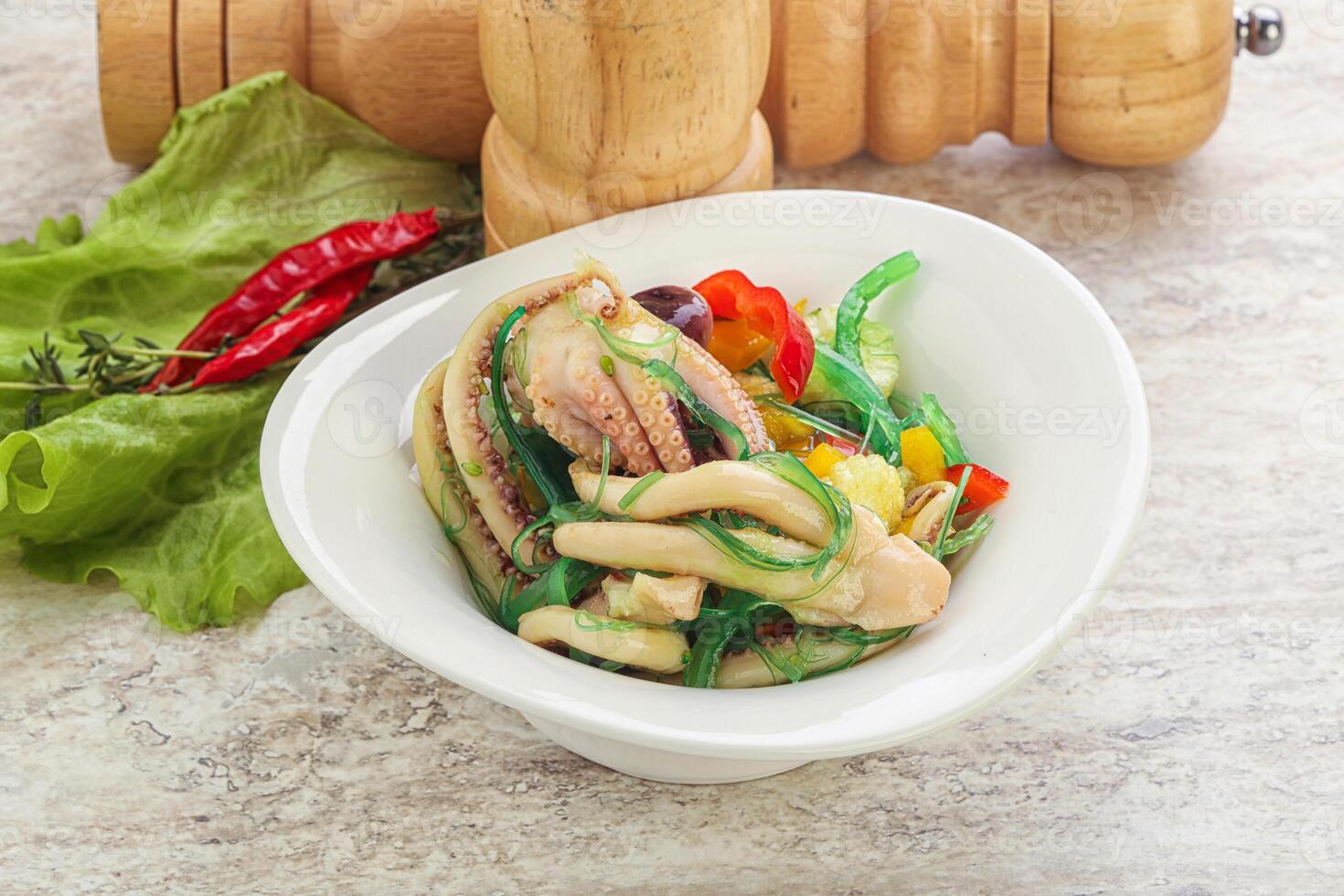 Salad with baby octopus and chukka photo