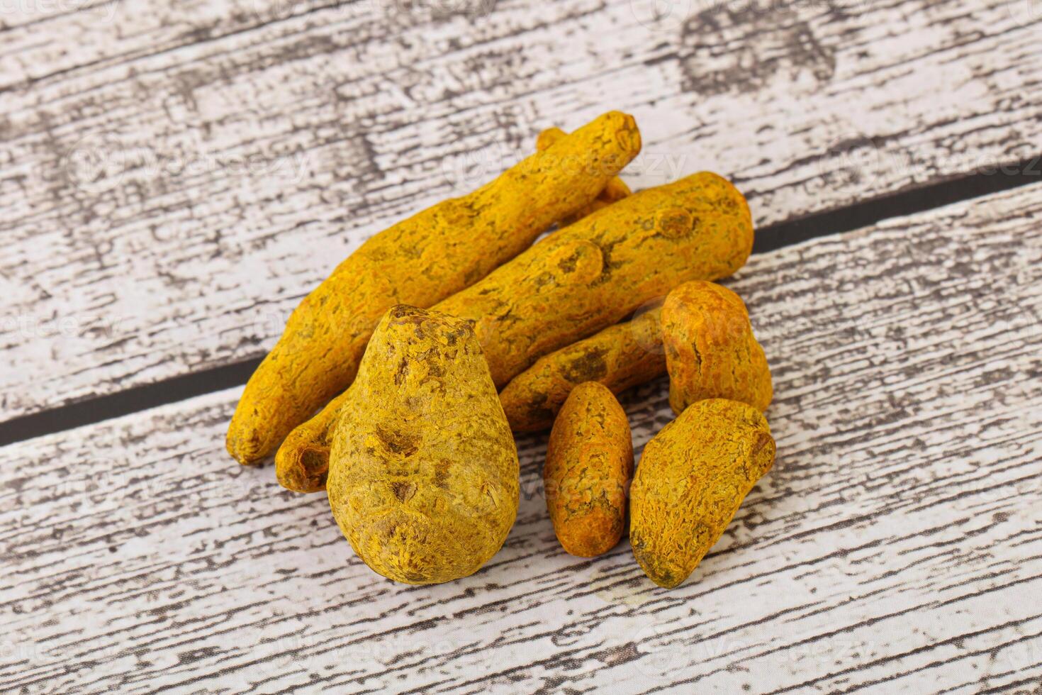 Indian spices - Turmeric root Curcuma photo
