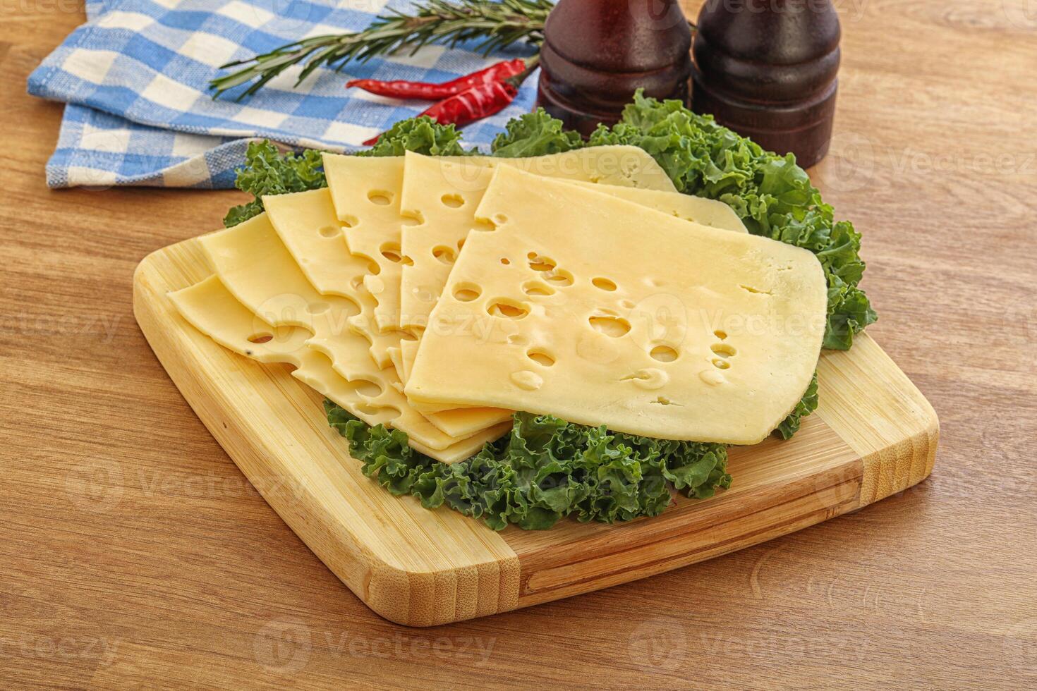Sliced maasdam cheese for breakfast photo