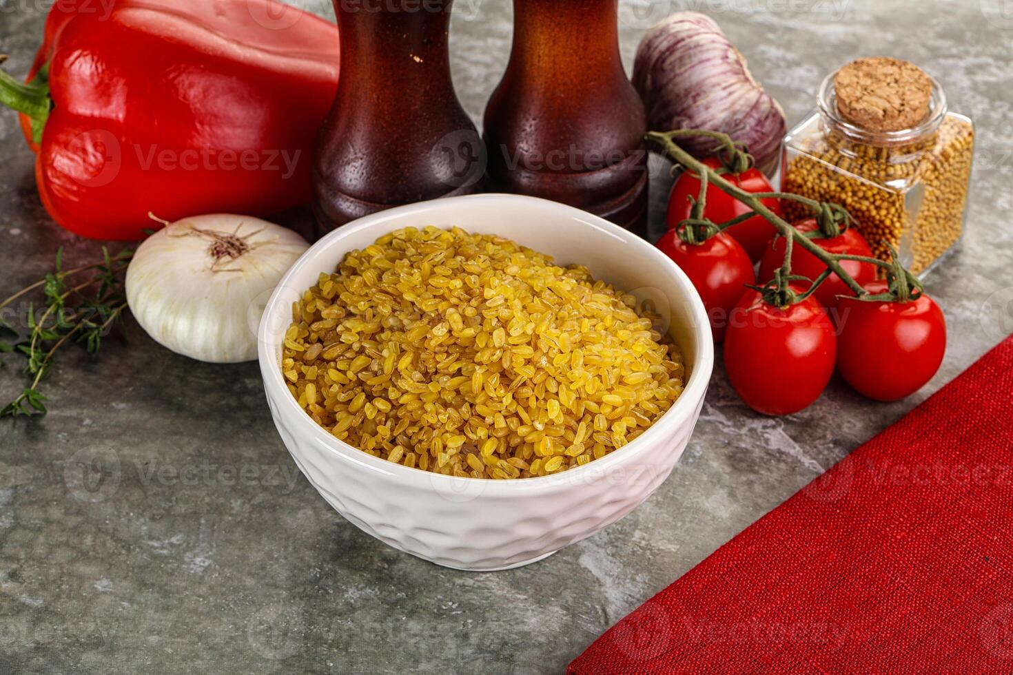 Dry wheat bulgur cereal heap photo