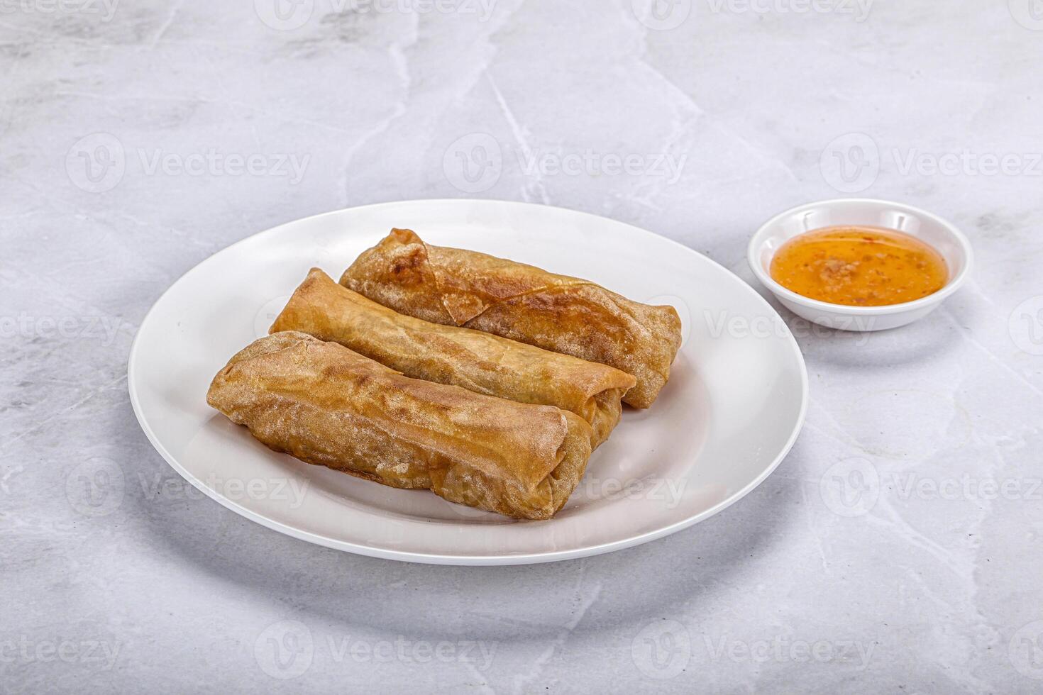 Traditional crispy fried stuffed springroll photo