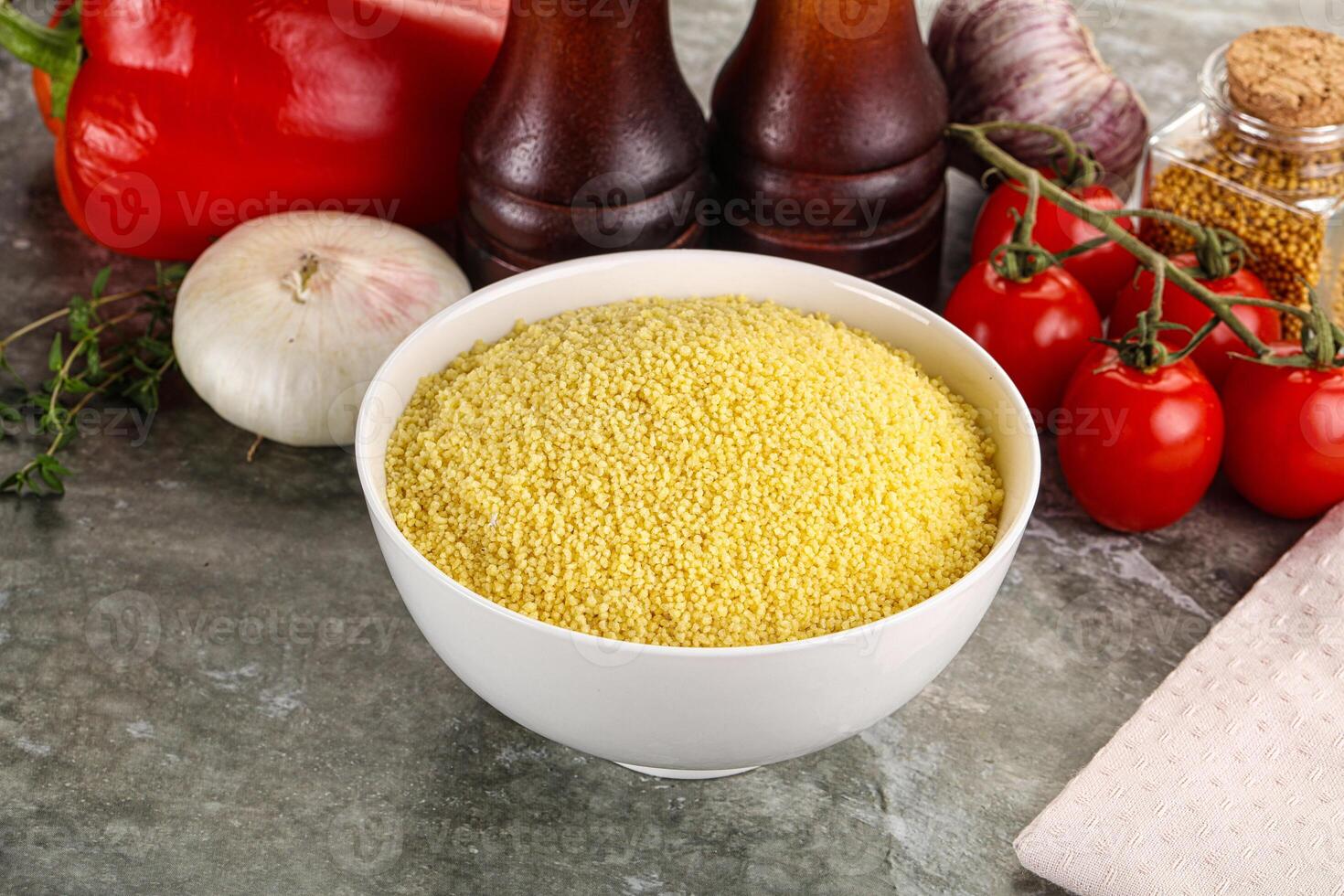 Raw dry wheat couscous grain photo